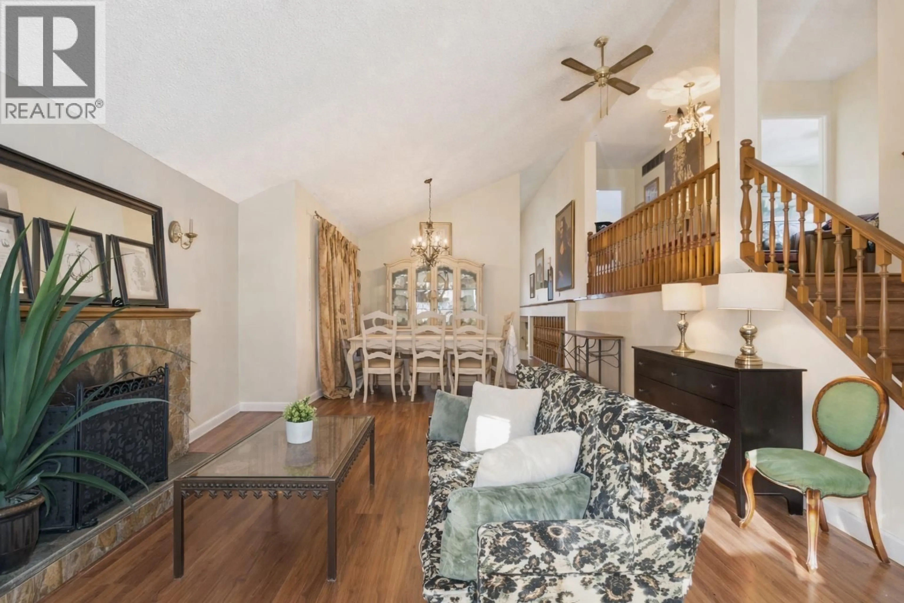 Living room with furniture, wood/laminate floor for 875 PORTEAU PLACE, North Vancouver British Columbia V7H2P8