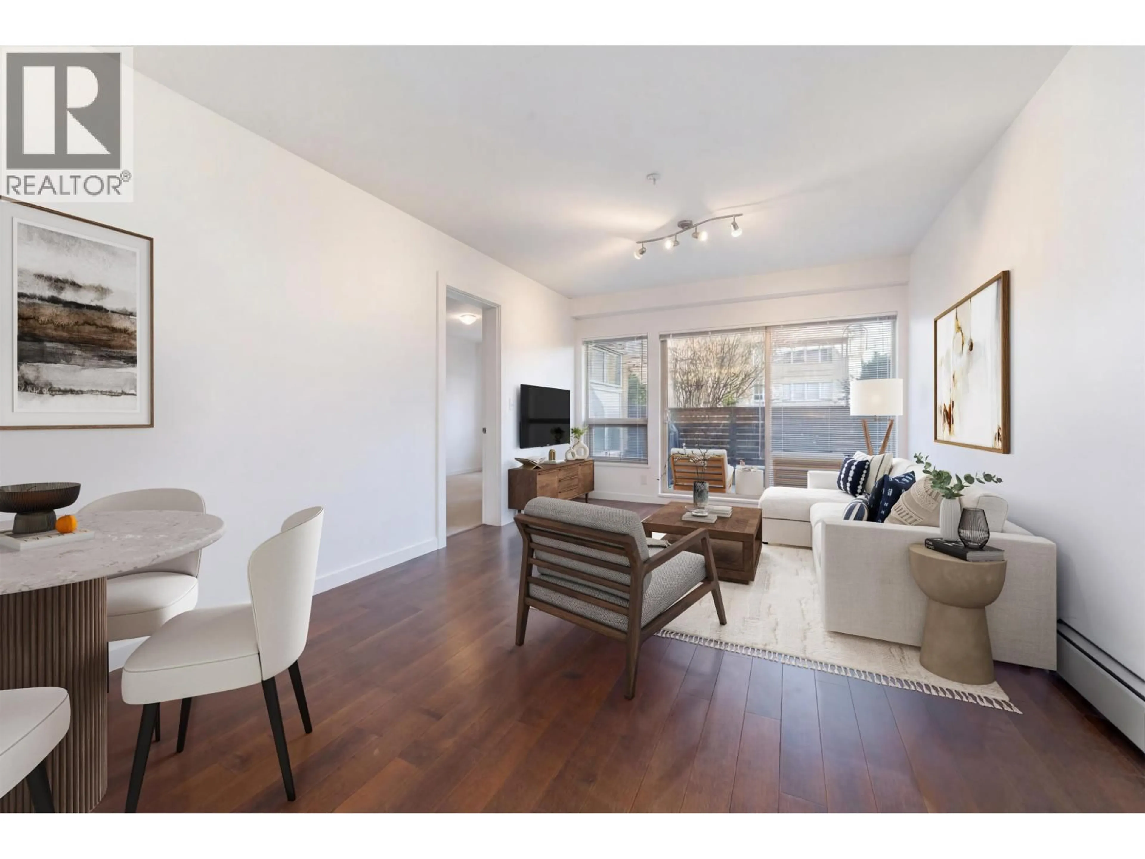 Living room with furniture, wood/laminate floor for 109 - 1033 ST. GEORGES AVENUE, North Vancouver British Columbia V7L3H5