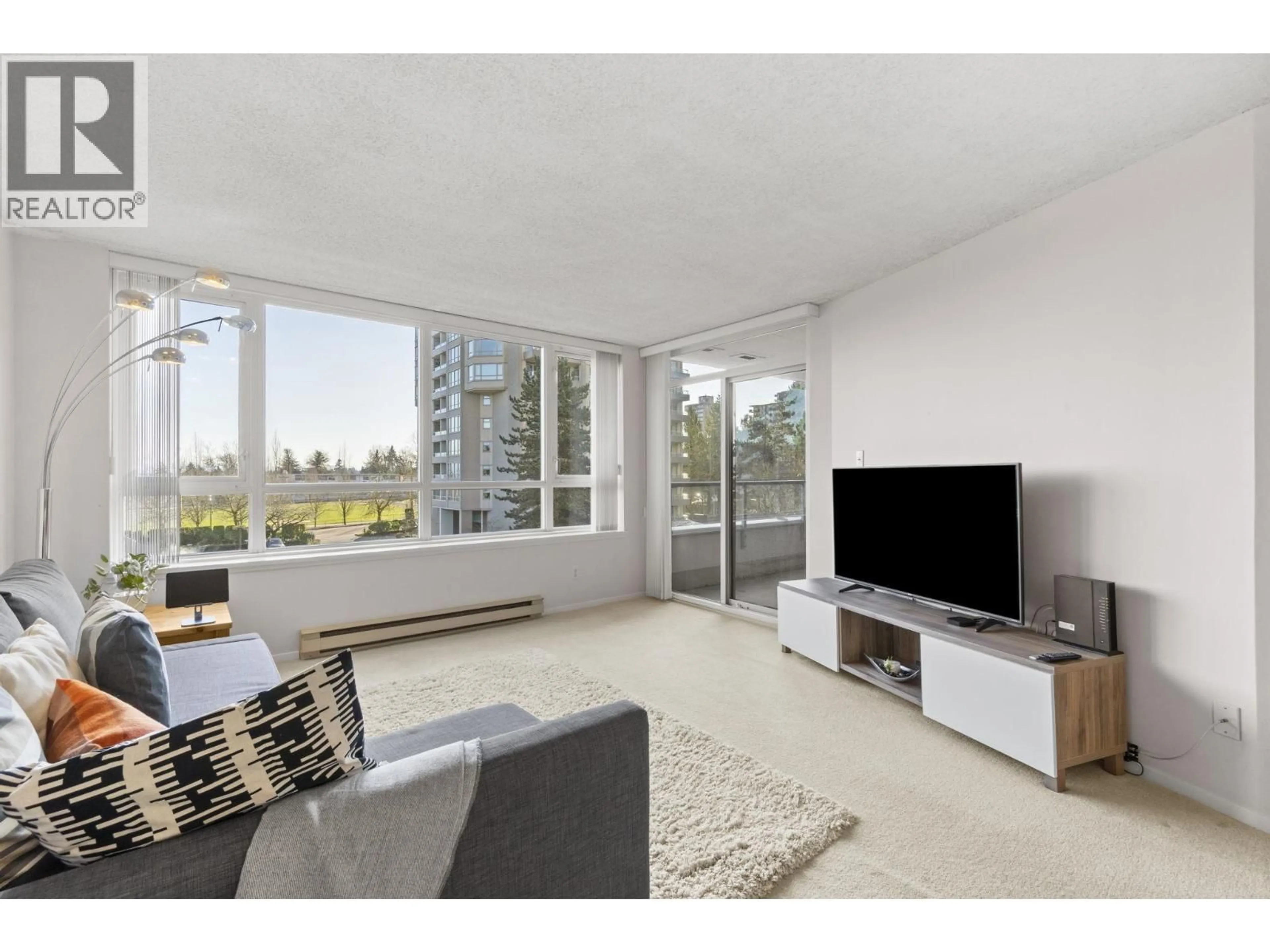 Living room with furniture, unknown for 408 - 6070 MCMURRAY AVENUE, Burnaby British Columbia V5H4J3