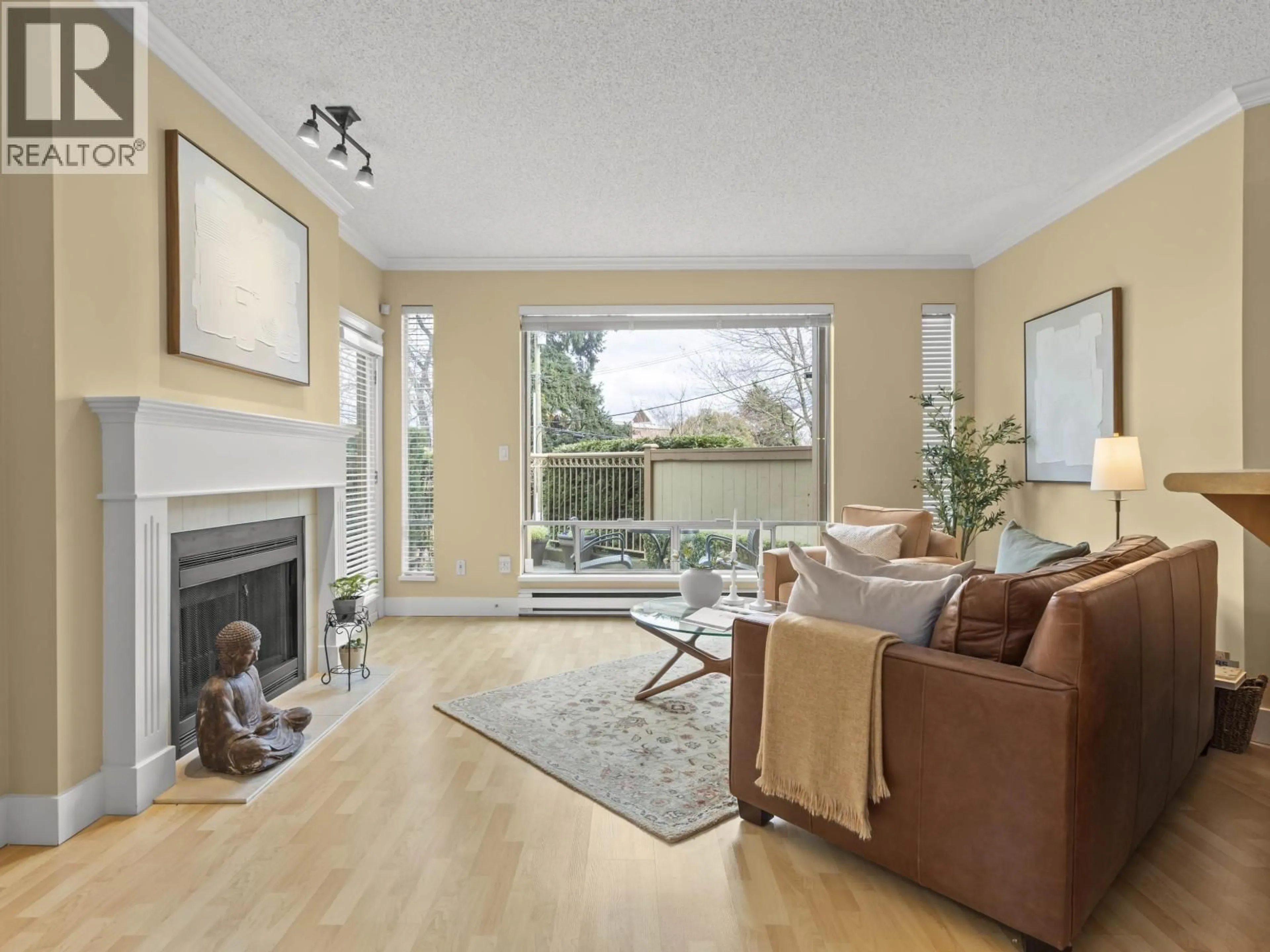 Living room with furniture, wood/laminate floor for 103 - 1100 7TH AVENUE, Vancouver British Columbia V6H1B4