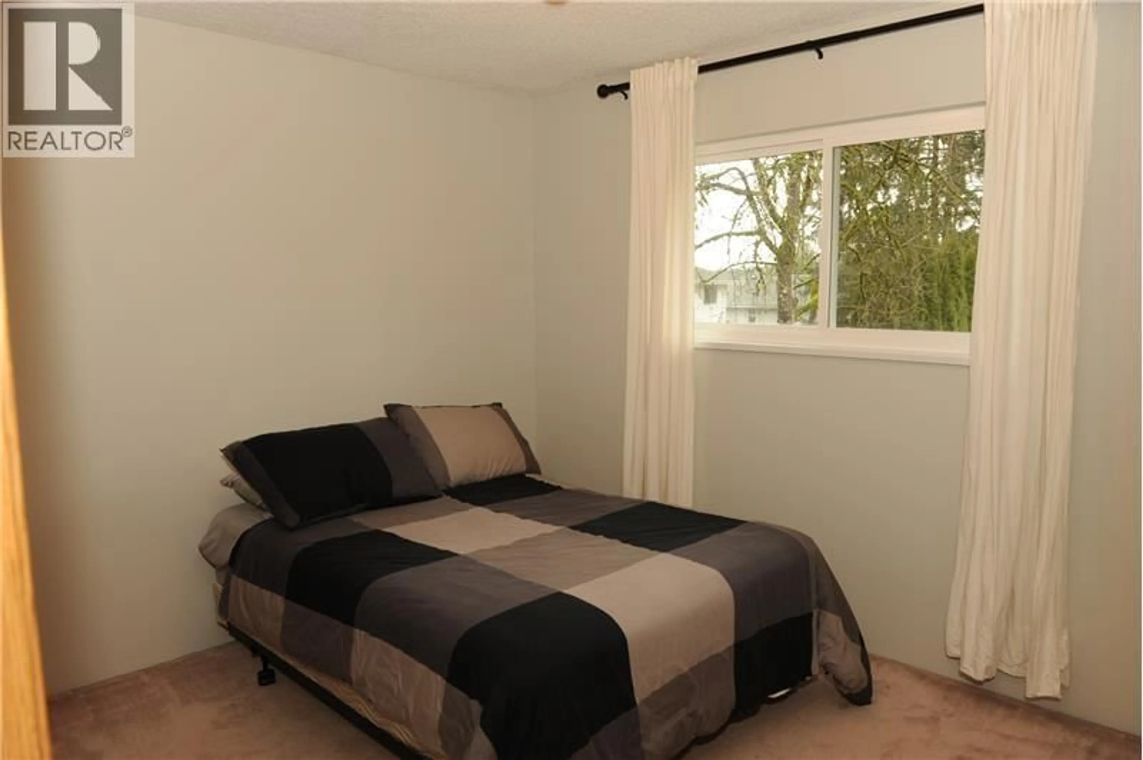 Bedroom with bed, wood/laminate floor for 22130 RIVER BEND, Maple Ridge British Columbia V2X9P3