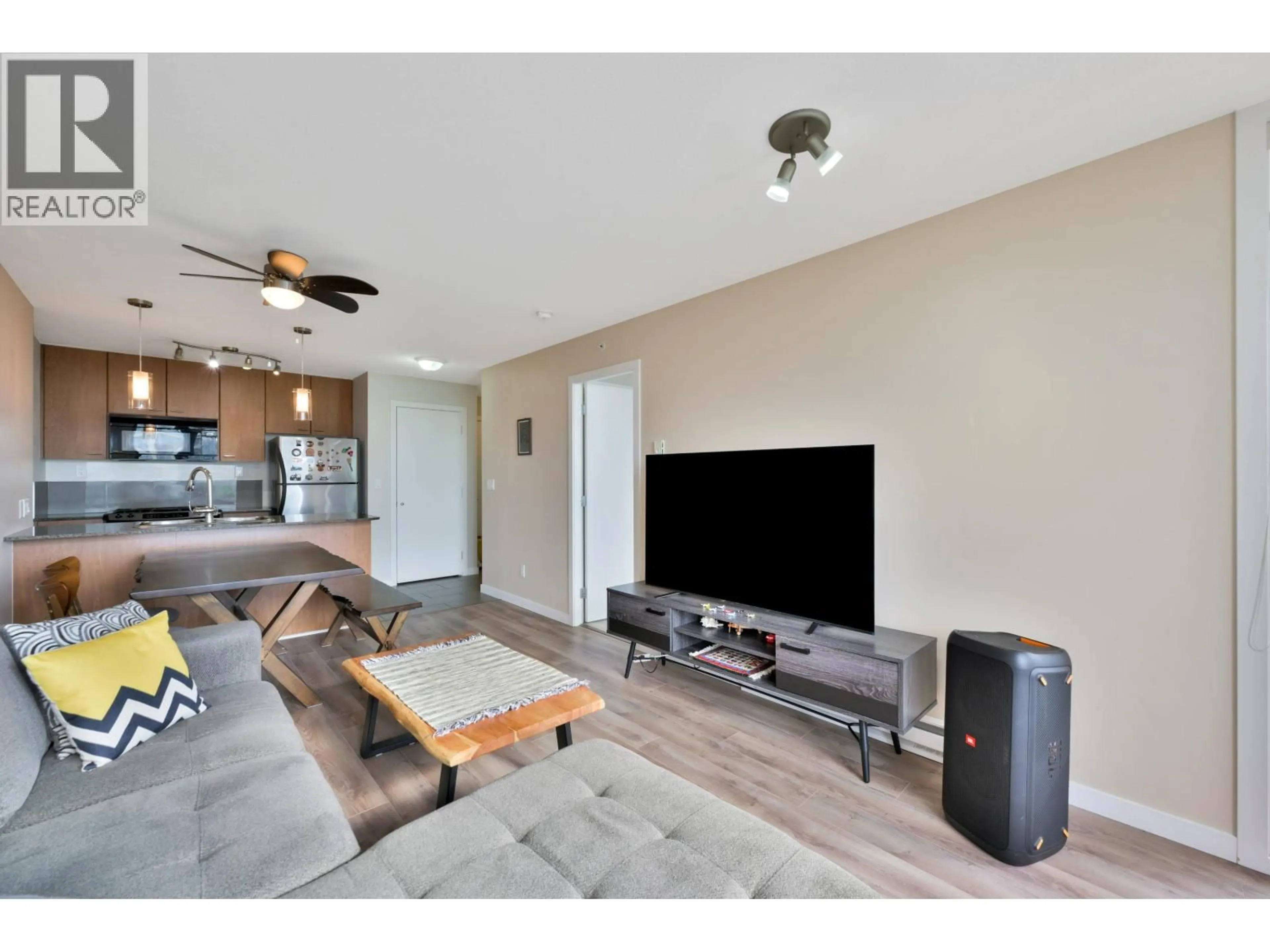 Living room with furniture, wood/laminate floor for 2508 - 7063 HALL AVENUE, Burnaby British Columbia V5E0A5