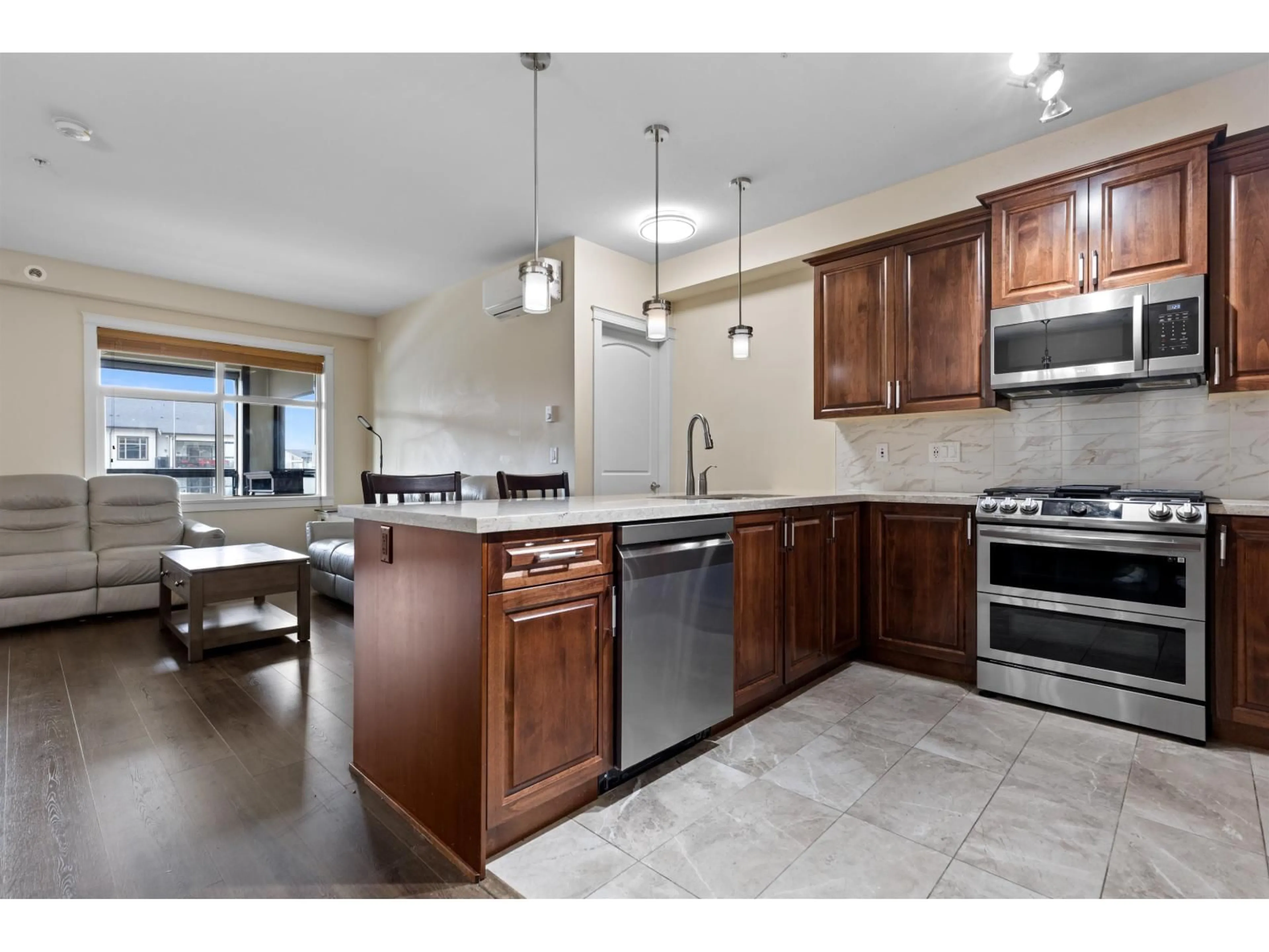 Open concept kitchen, ceramic/tile floor for 408 - 8561 203A STREET, Langley British Columbia V2Y3L7