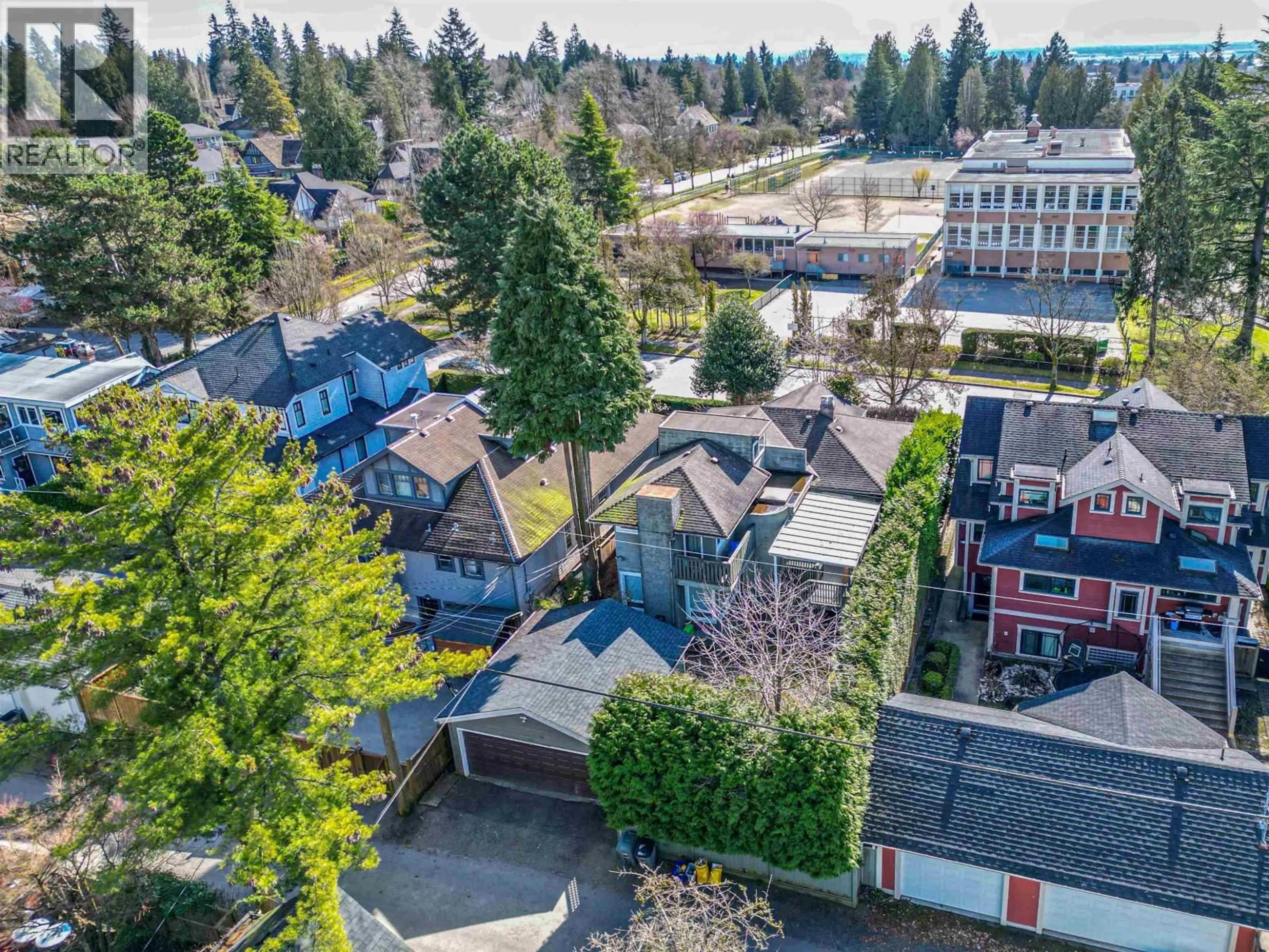 A pic from outside/outdoor area/front of a property/back of a property/a pic from drone, street for 1987 37TH AVENUE, Vancouver British Columbia V6M1N5
