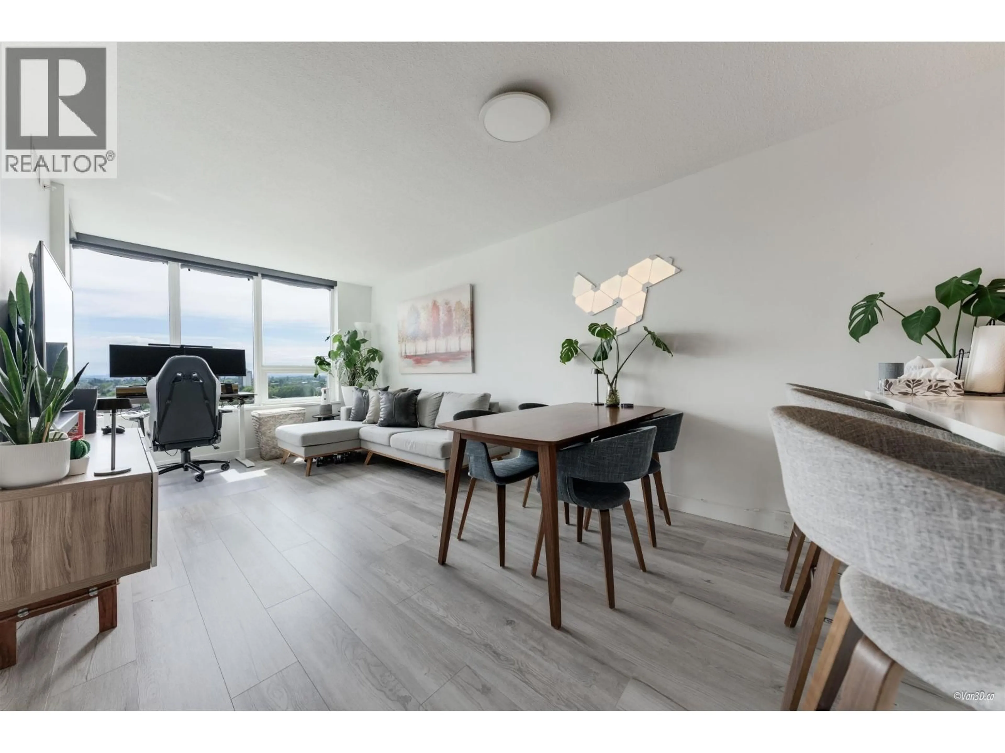 Living room with furniture, wood/laminate floor for 1703 - 3233 KETCHESON ROAD, Richmond British Columbia V6X0R3