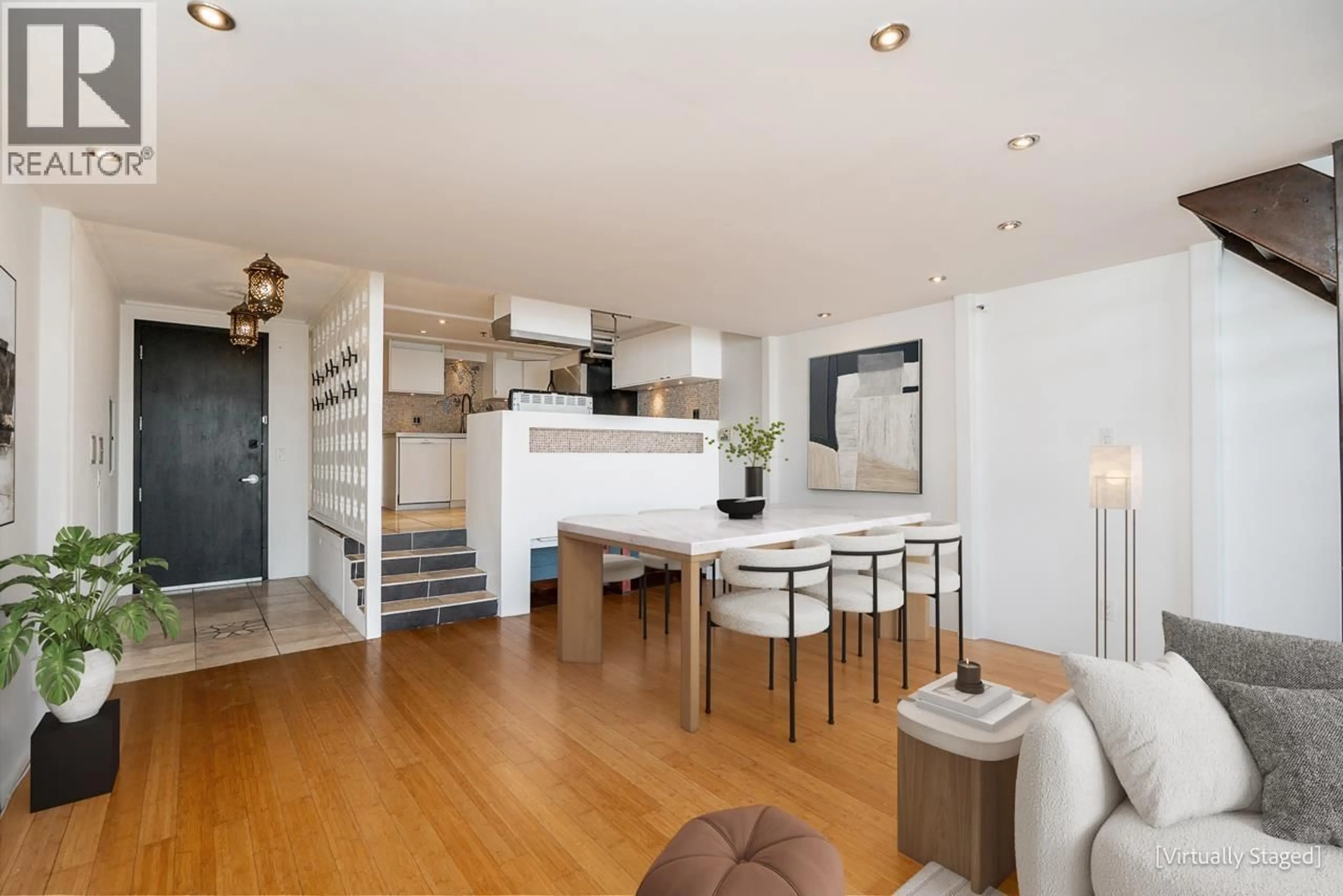 Open concept kitchen, wood/laminate floor for 202 - 1850 LORNE STREET, Vancouver British Columbia V5T1C9