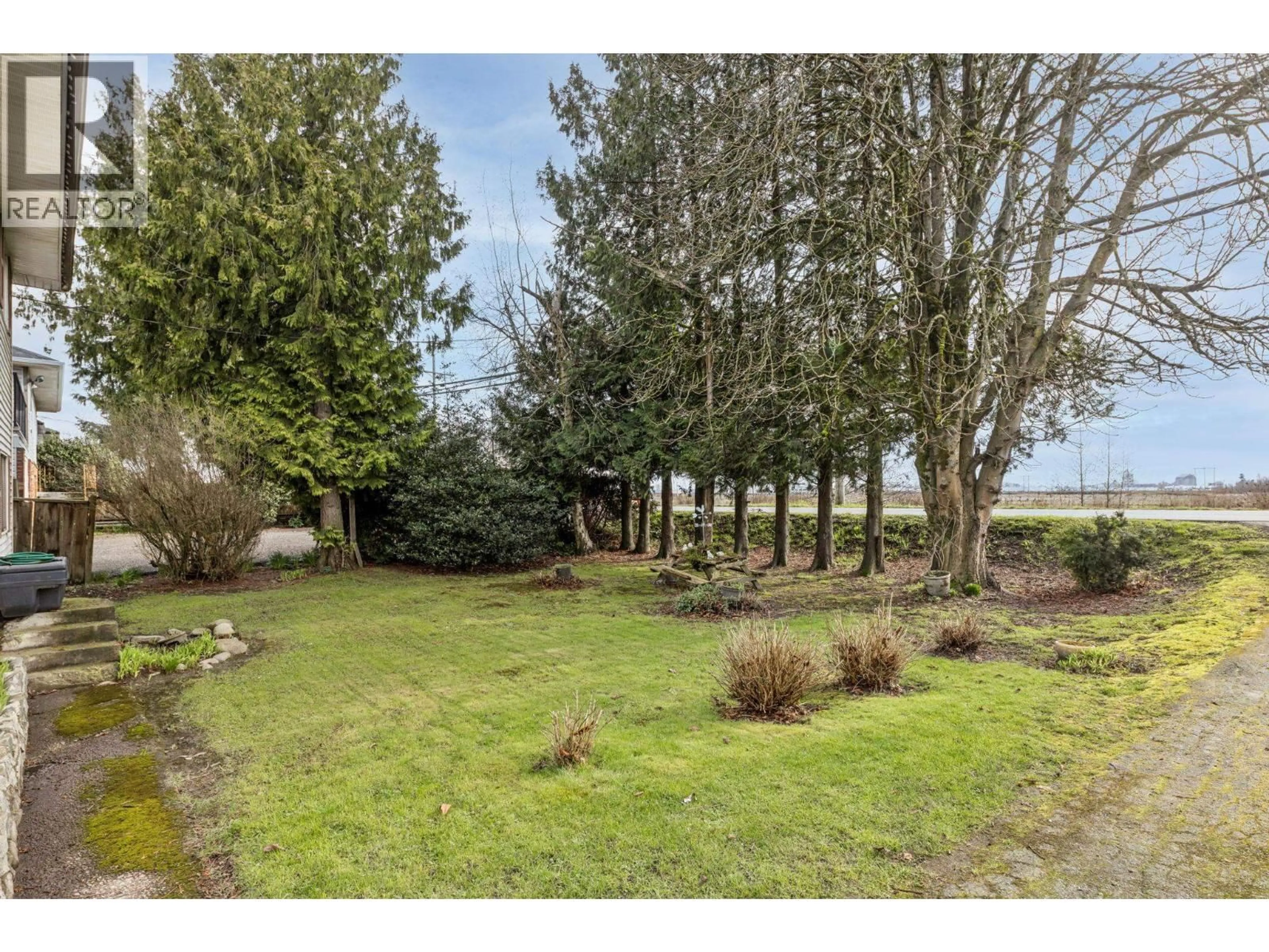 A pic from outside/outdoor area/front of a property/back of a property/a pic from drone, water/lake/river/ocean view for 17311 WESTMINSTER HIGHWAY, Richmond British Columbia V6V1A9