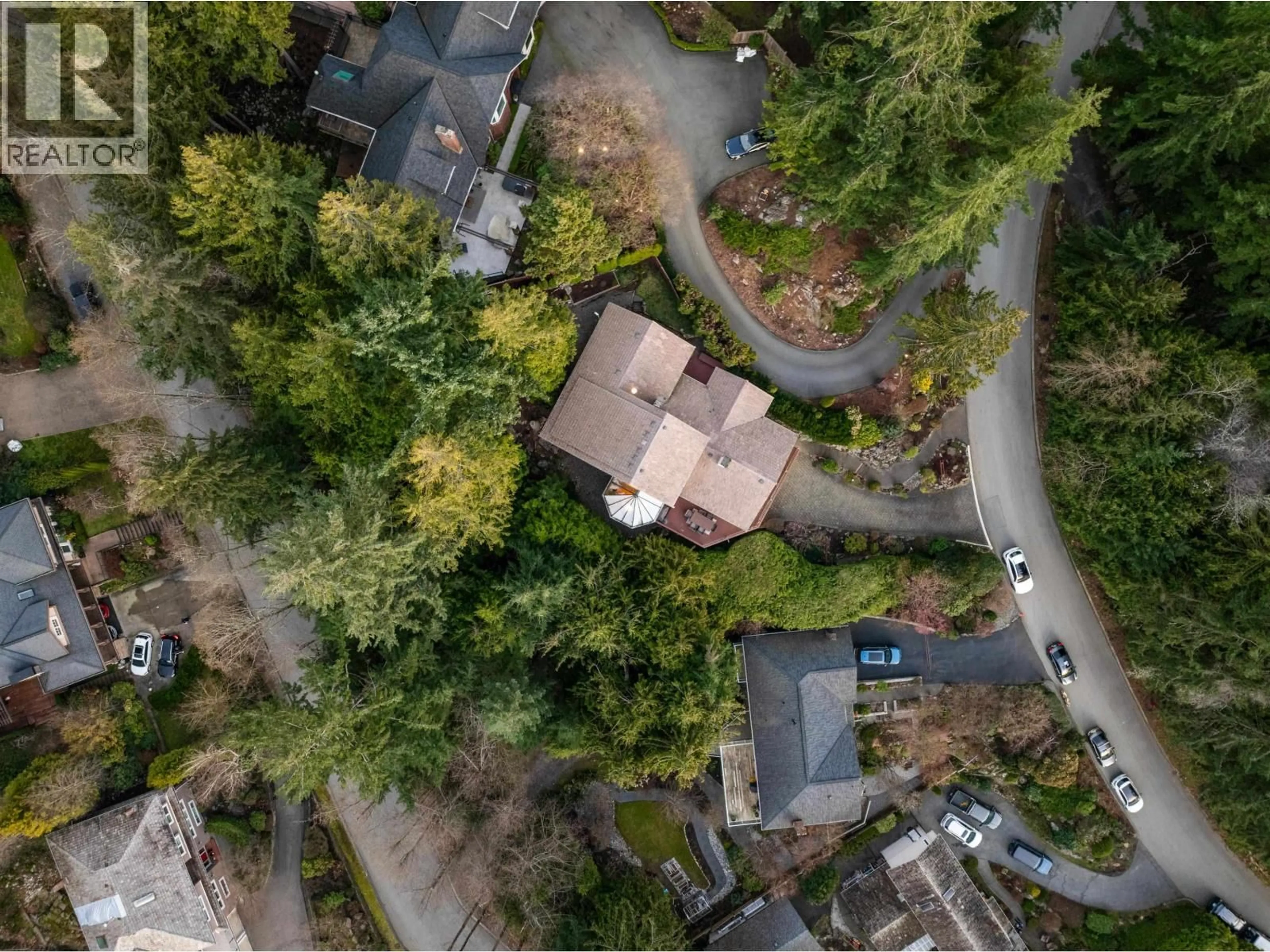 A pic from outside/outdoor area/front of a property/back of a property/a pic from drone, forest/trees view for 4721 WOODSIDE PLACE, West Vancouver British Columbia V7S2X5
