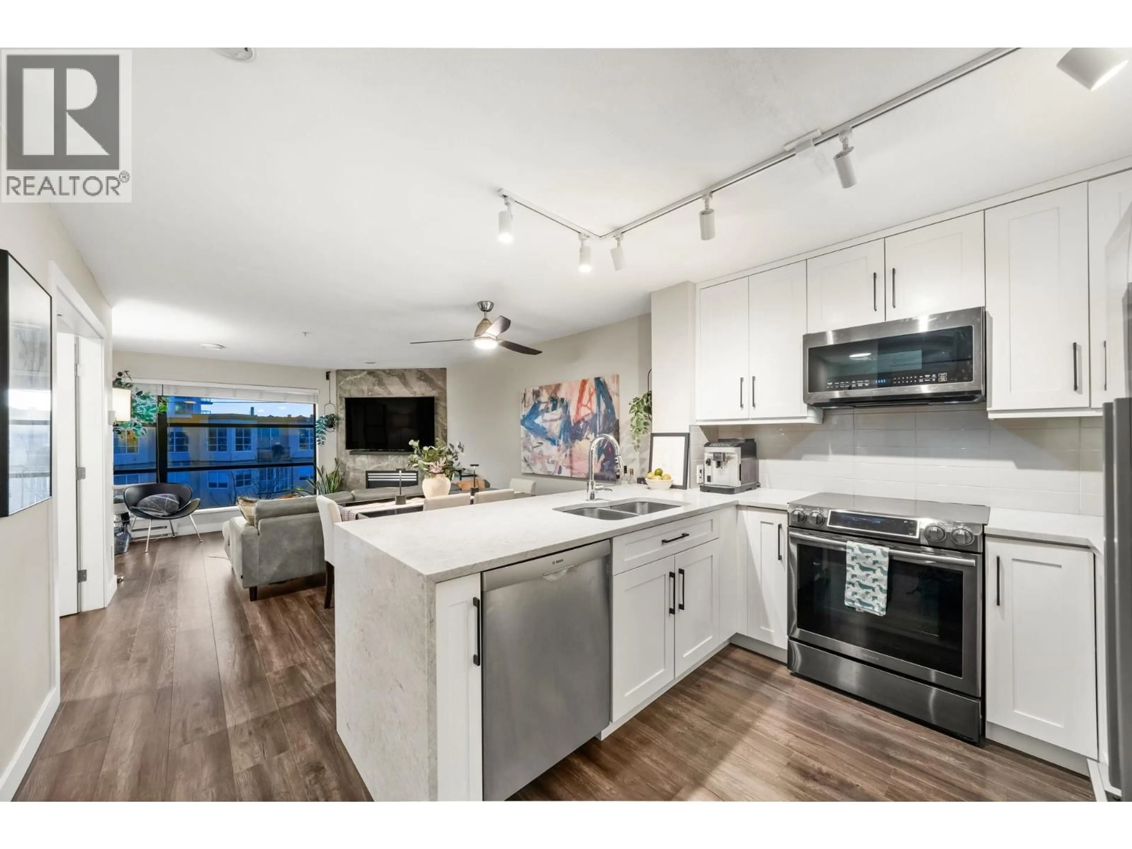 Open concept kitchen, unknown for 410 - 124 3RD STREET, North Vancouver British Columbia V7M1E8