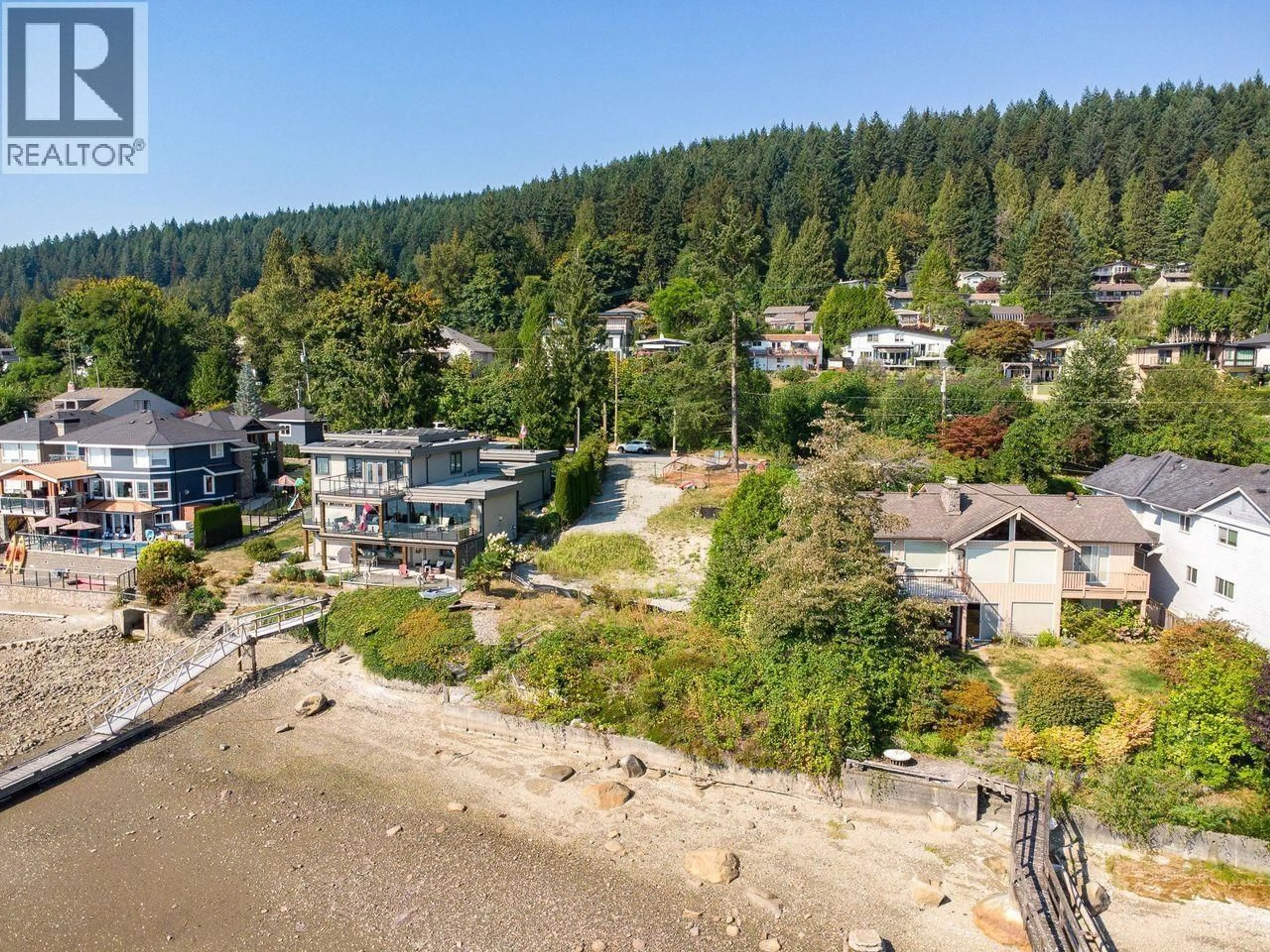 A pic from outside/outdoor area/front of a property/back of a property/a pic from drone, water/lake/river/ocean view for 668 ALDERSIDE ROAD, Port Moody British Columbia V3H3A5