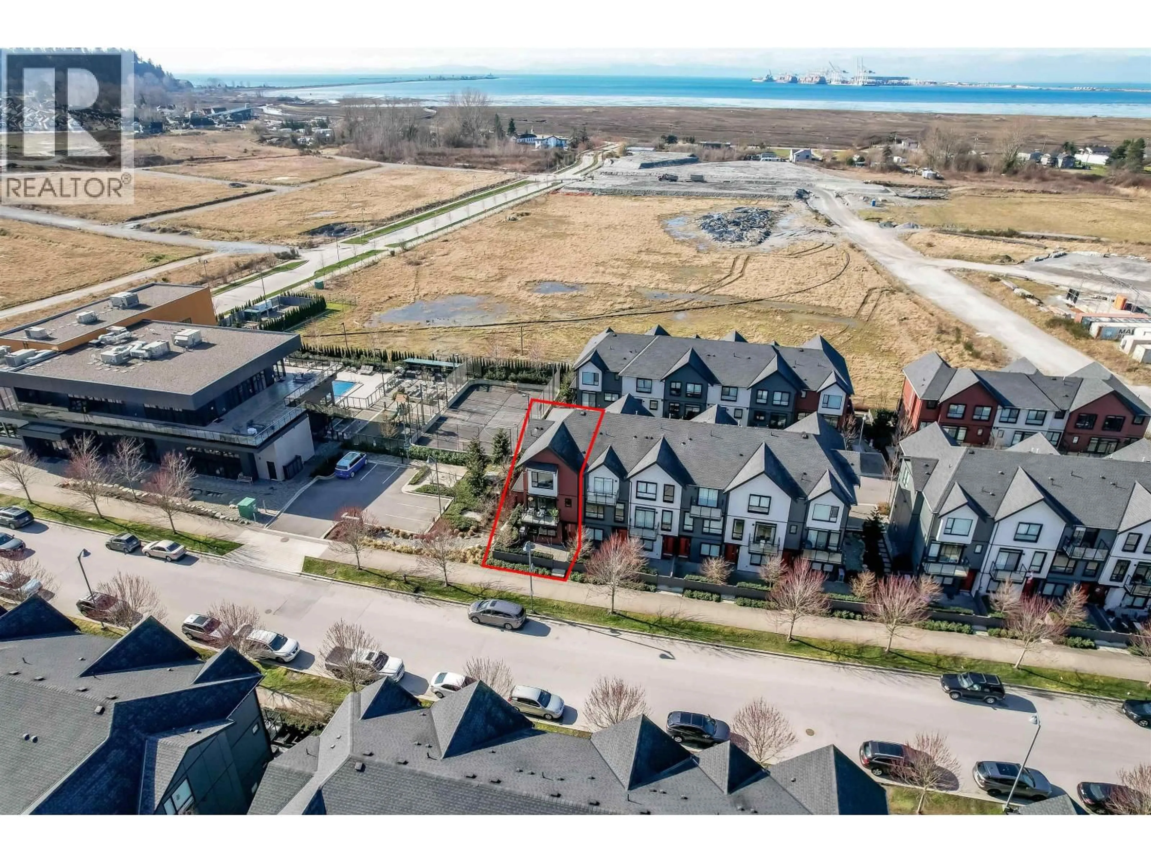 A pic from outside/outdoor area/front of a property/back of a property/a pic from drone, water/lake/river/ocean view for 111 - 4662 HEMLOCK WAY, Tsawwassen British Columbia V4M0G1