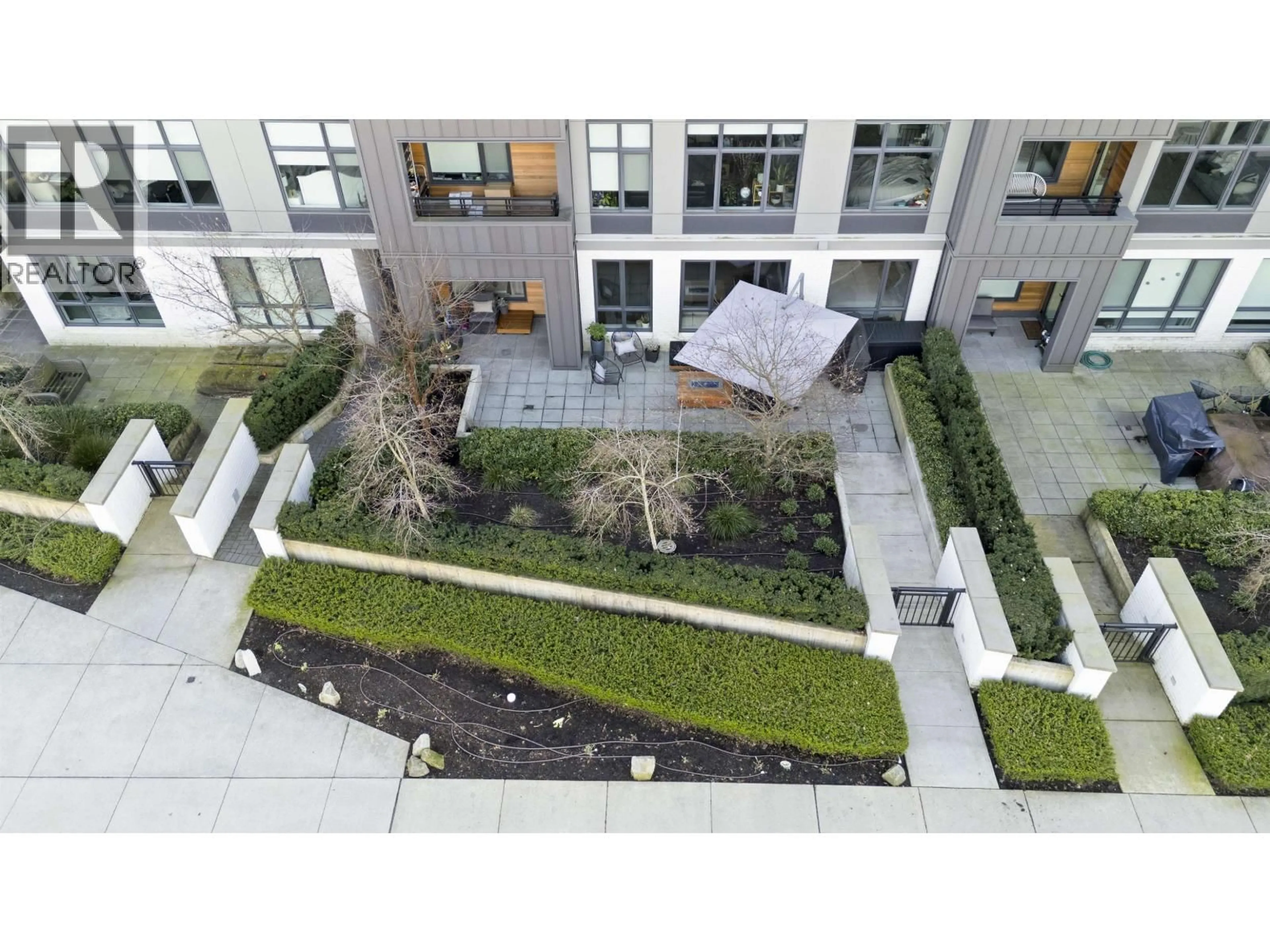 A pic from outside/outdoor area/front of a property/back of a property/a pic from drone, street for 116 - 747 E 3RD STREET, North Vancouver British Columbia V7L1G8