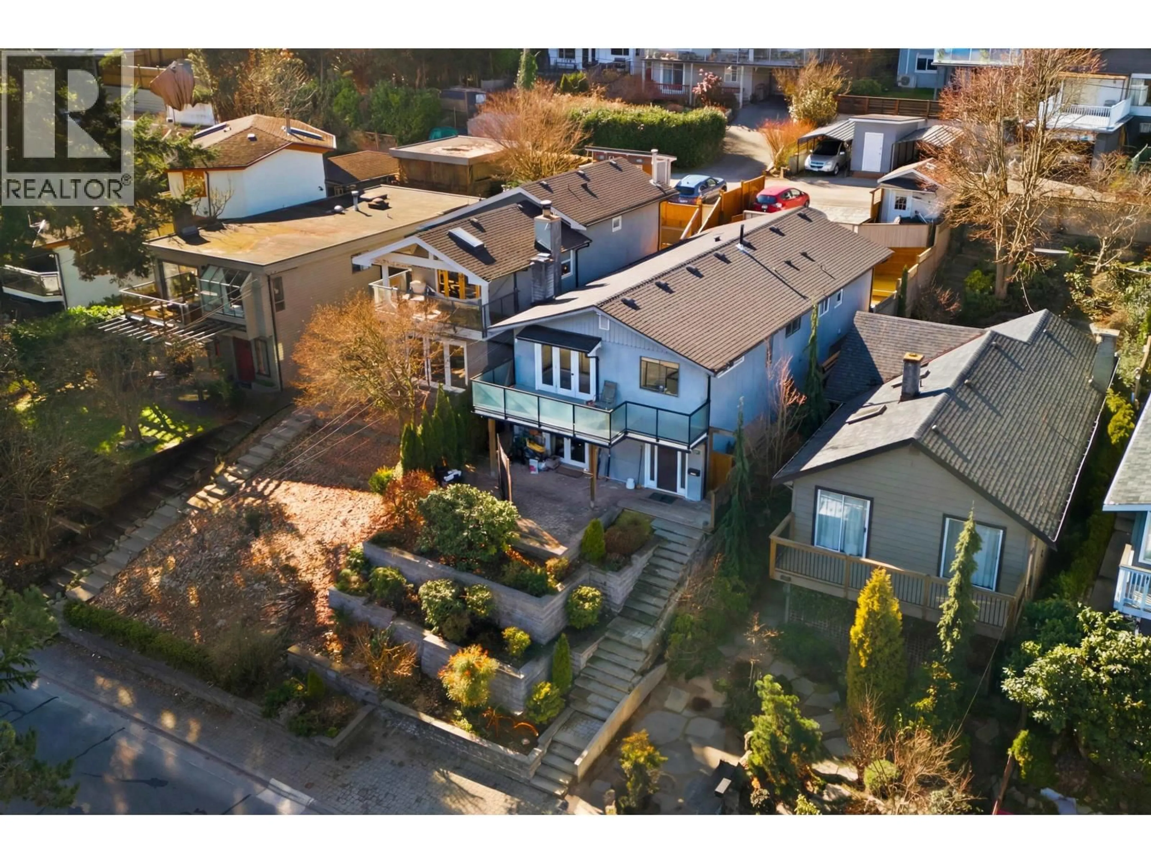 A pic from outside/outdoor area/front of a property/back of a property/a pic from drone, street for 1911 DEEP COVE ROAD, North Vancouver British Columbia V7G1S7