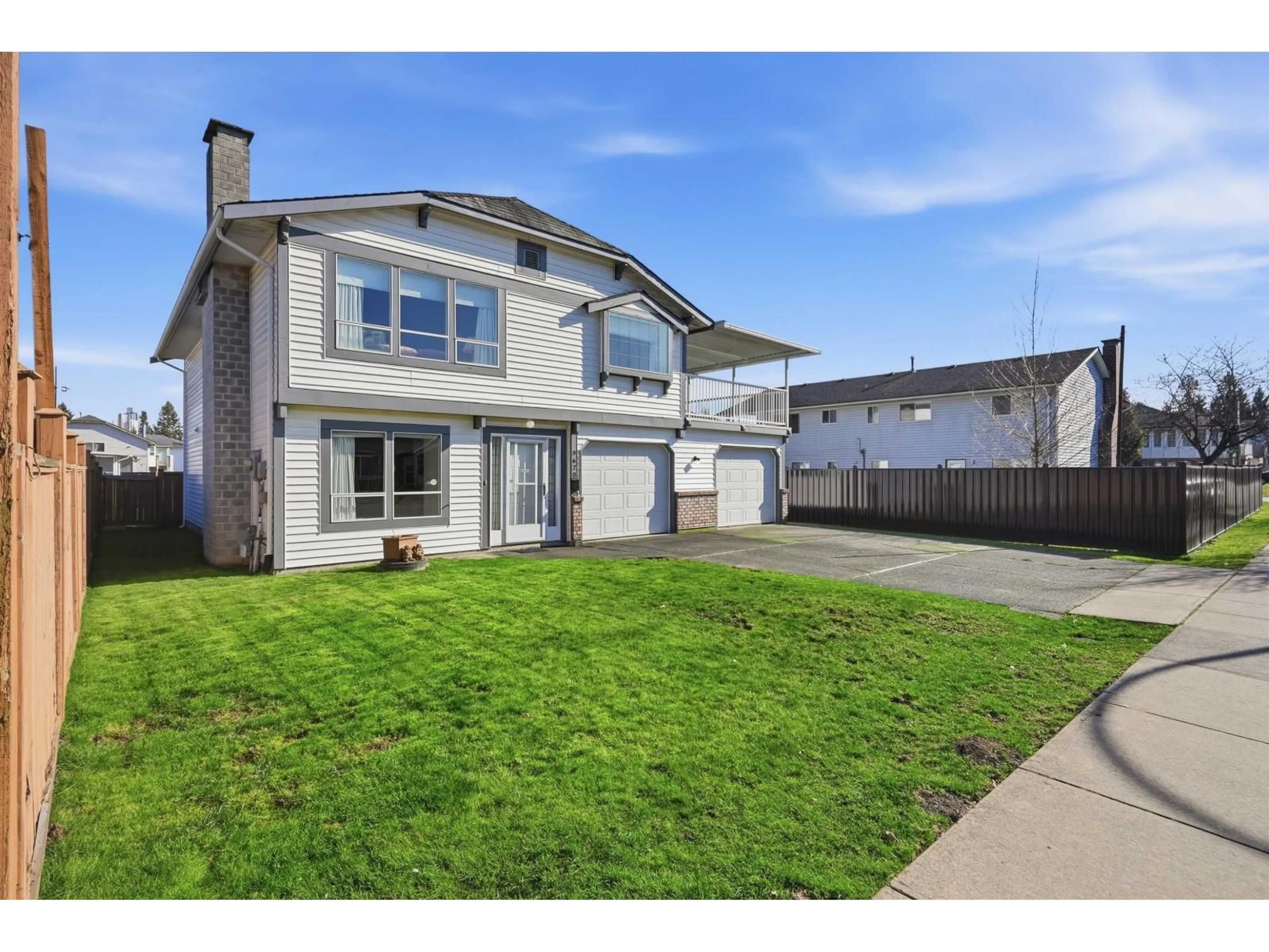 Home with vinyl exterior material, street for 9670 130 STREET, Surrey British Columbia V3T5N2