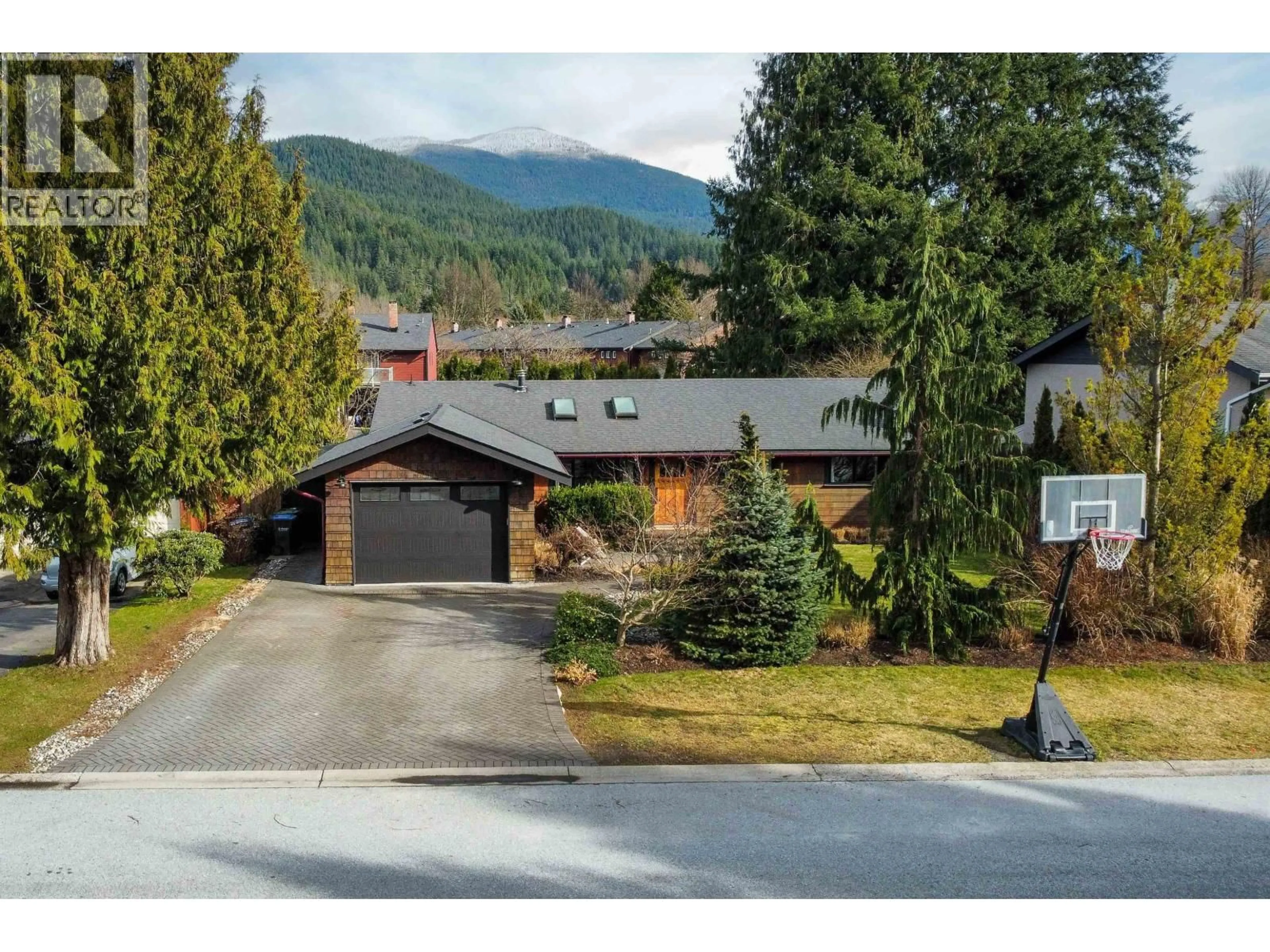 A pic from outside/outdoor area/front of a property/back of a property/a pic from drone, mountain view for 1518 EAGLE RUN DRIVE, Squamish British Columbia V0N1H0