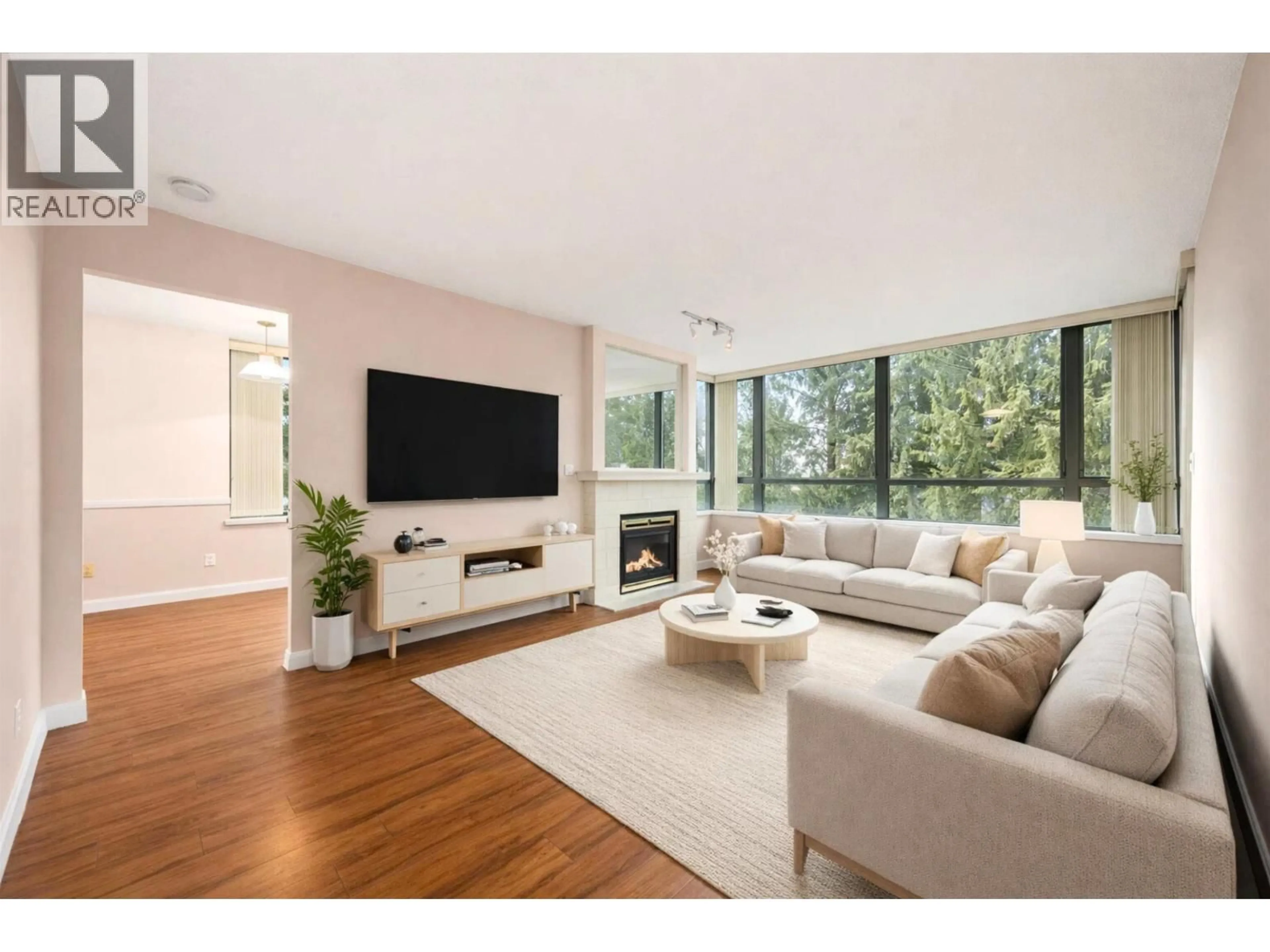 Living room with furniture, unknown for 306 - 6622 SOUTHOAKS CRESCENT, Burnaby British Columbia V5E4K2