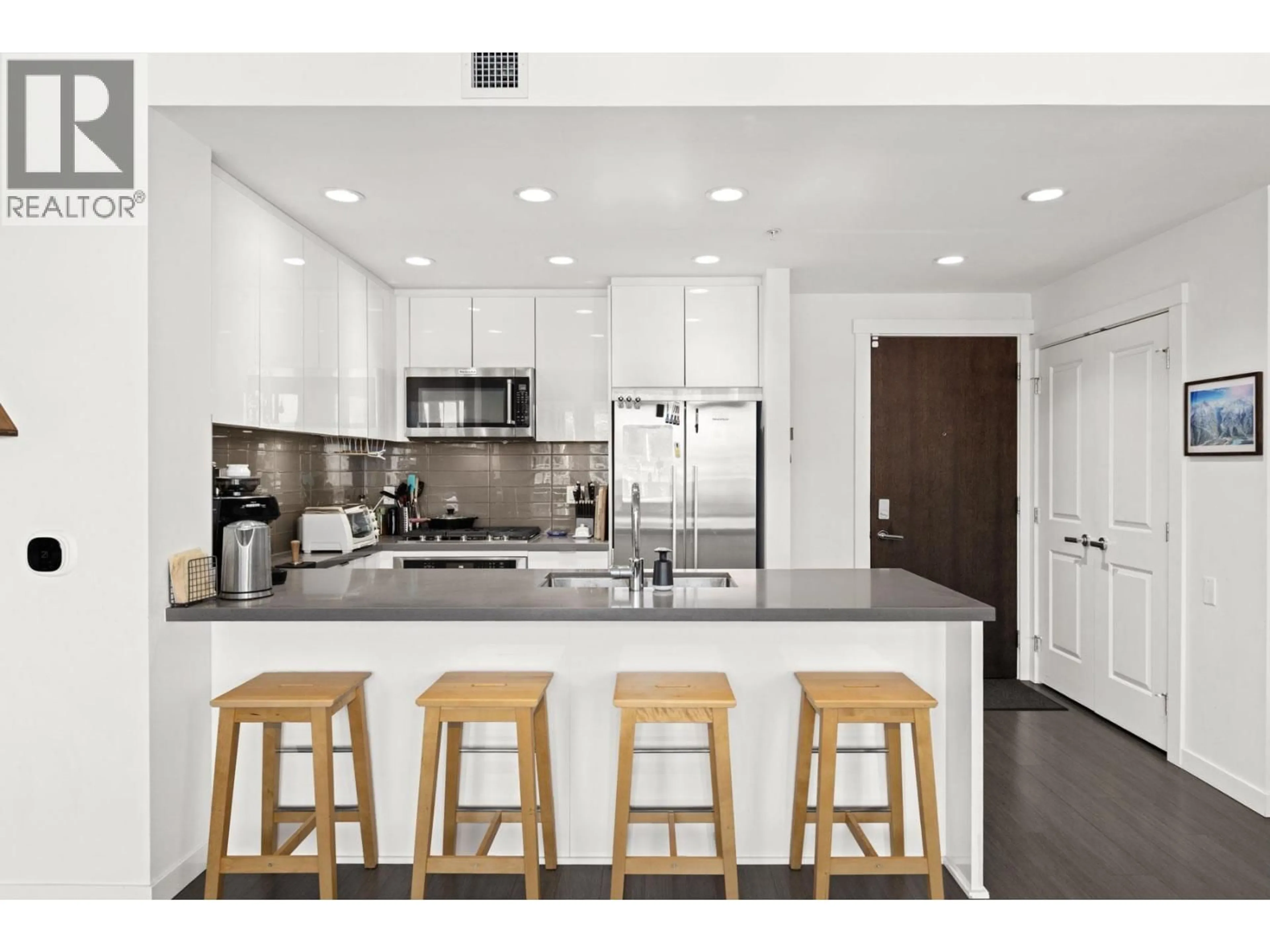 Open concept kitchen, ceramic/tile floor for 208 - 277 1ST STREET, North Vancouver British Columbia V7M0E8