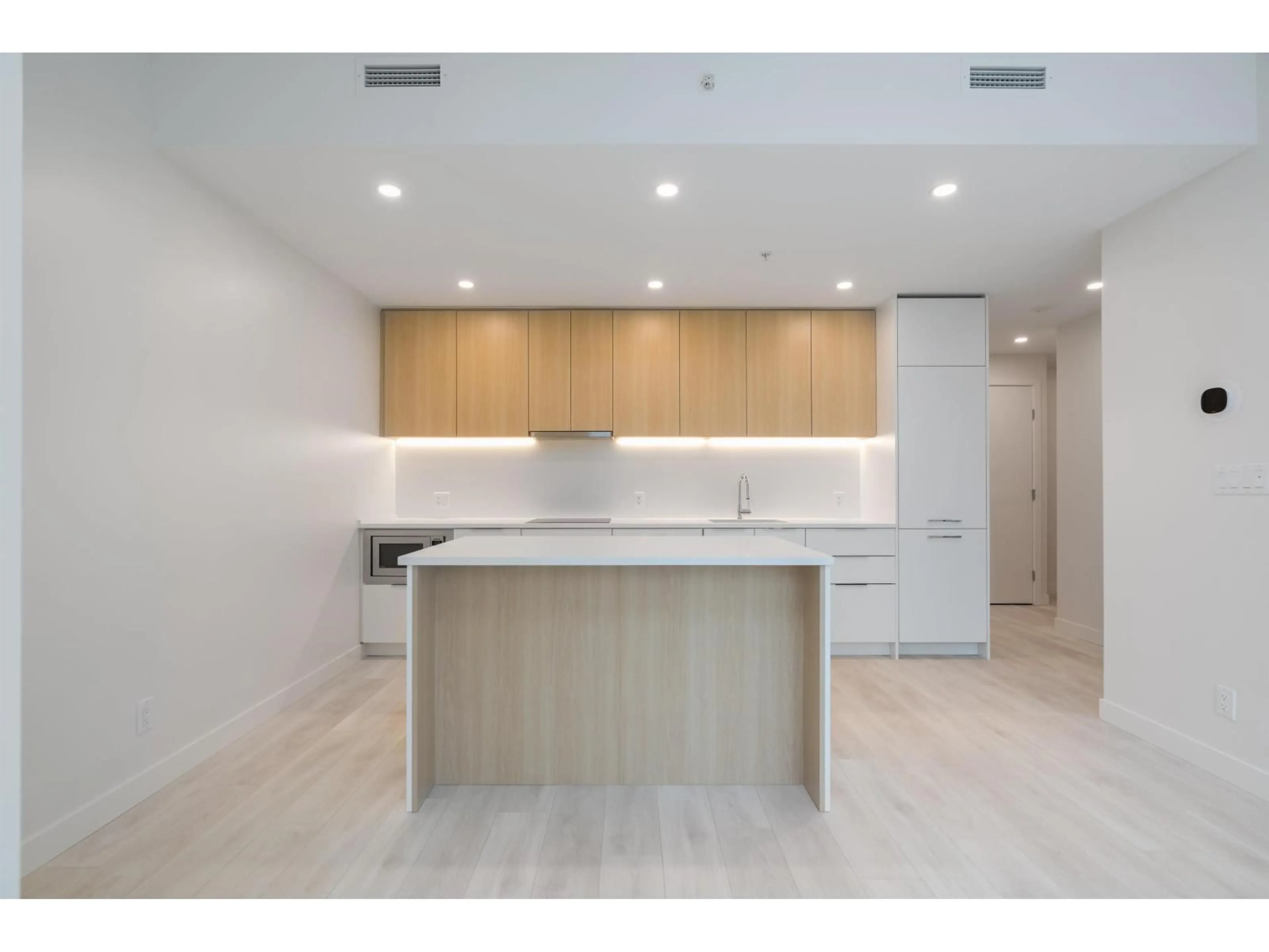 Open concept kitchen, unknown for 102 - 13318 104 AVENUE, Surrey British Columbia V3T0R2