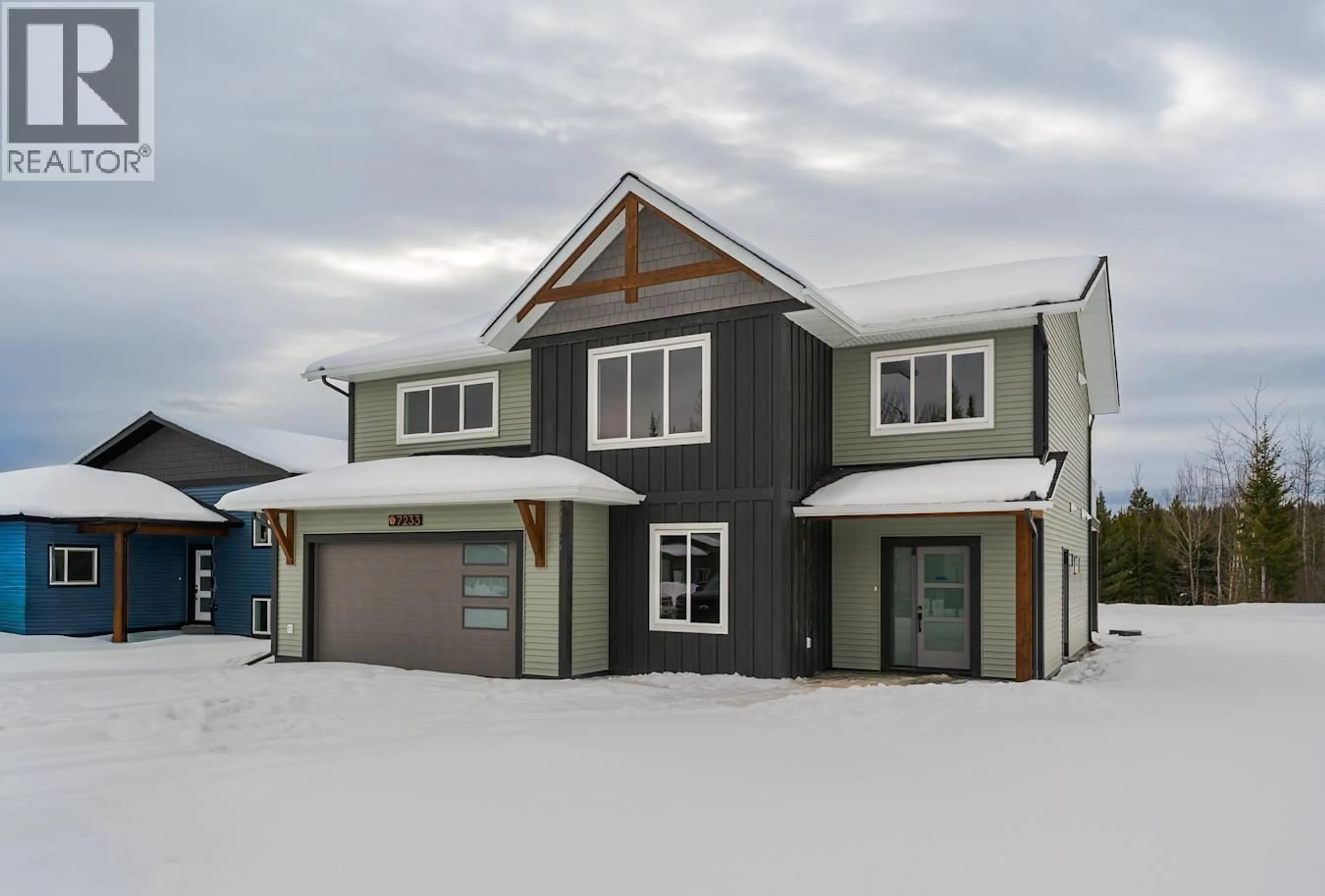 Home with vinyl exterior material, street for 7233 HILLU ROAD, Prince George British Columbia V2K0B4