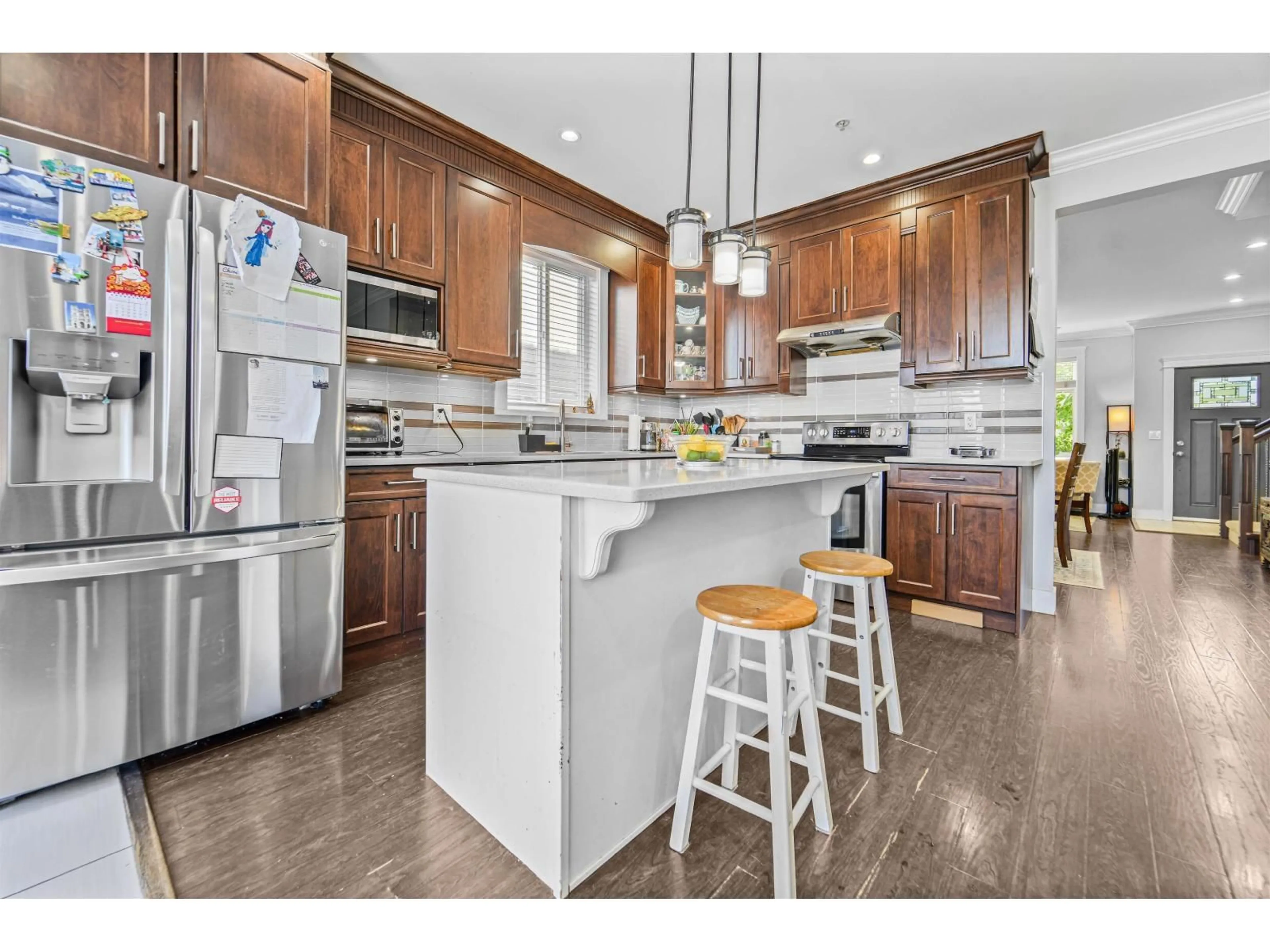 Open concept kitchen, ceramic/tile floor for 21065 80 AVENUE, Langley British Columbia V2Y0J4