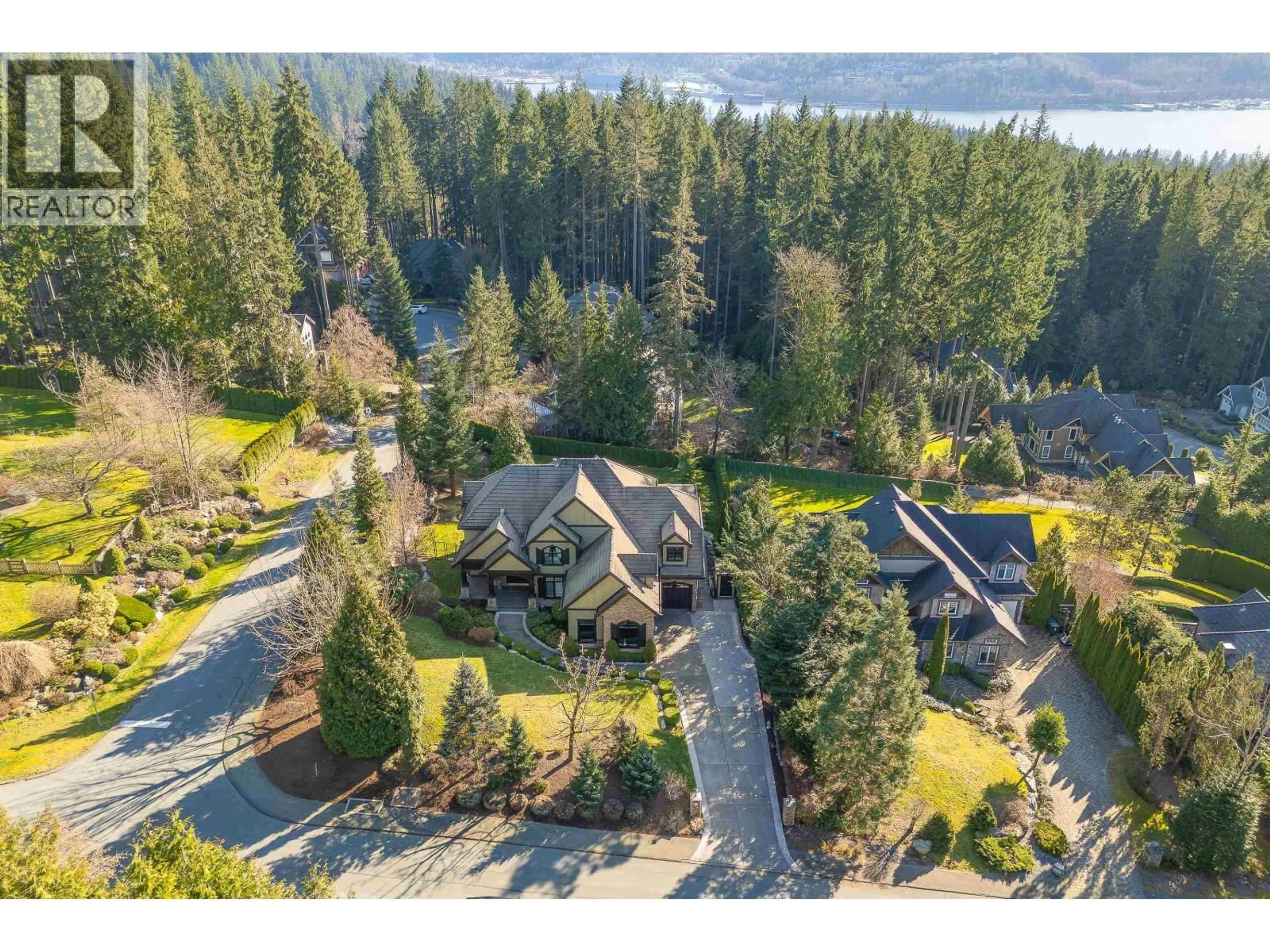 A pic from outside/outdoor area/front of a property/back of a property/a pic from drone, water/lake/river/ocean view for 1062 MAGNOLIA WAY, Anmore British Columbia V3H5M6