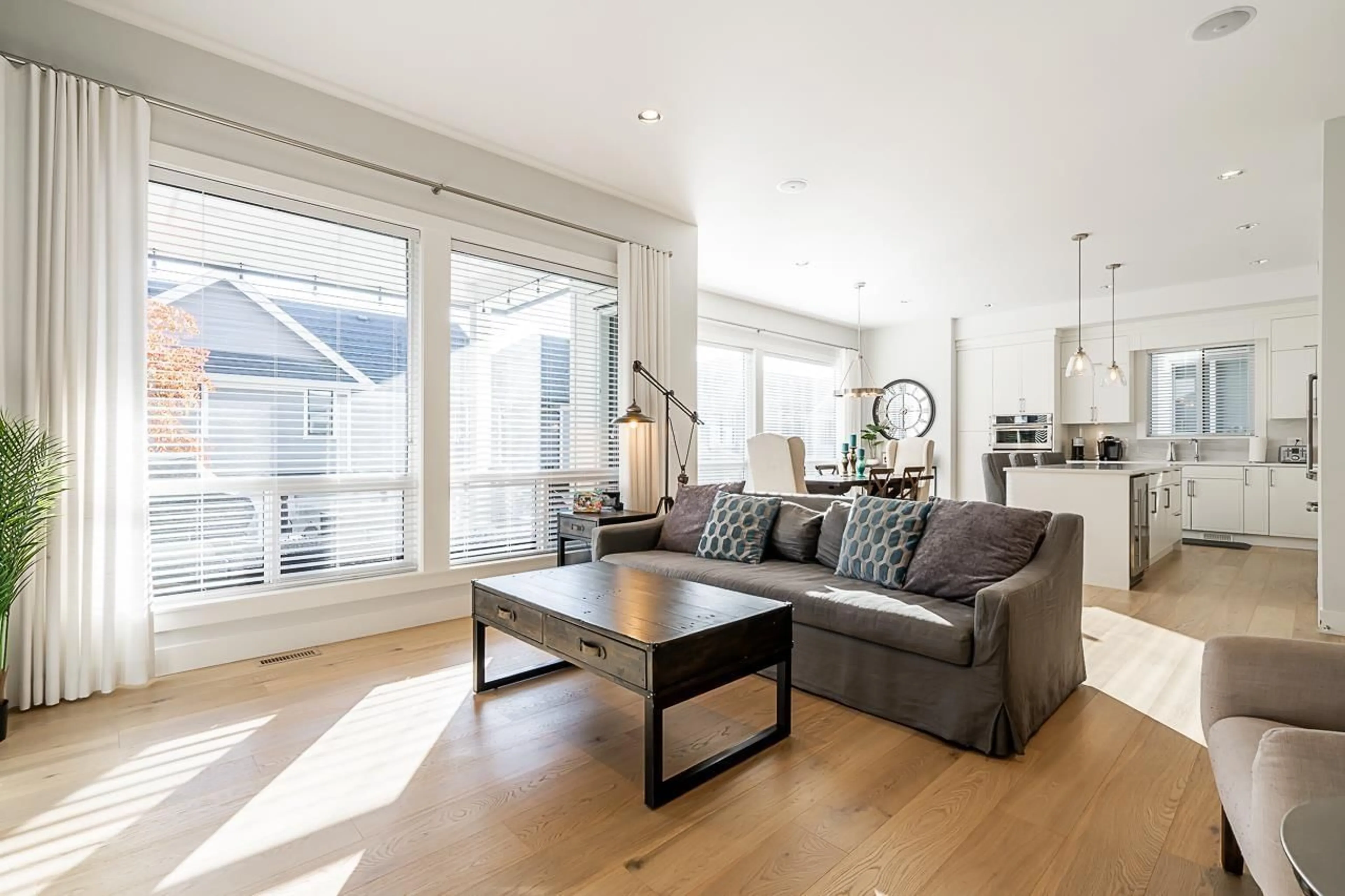 Living room with furniture, wood/laminate floor for 16752 17A AVENUE, Surrey British Columbia V3Z0T3