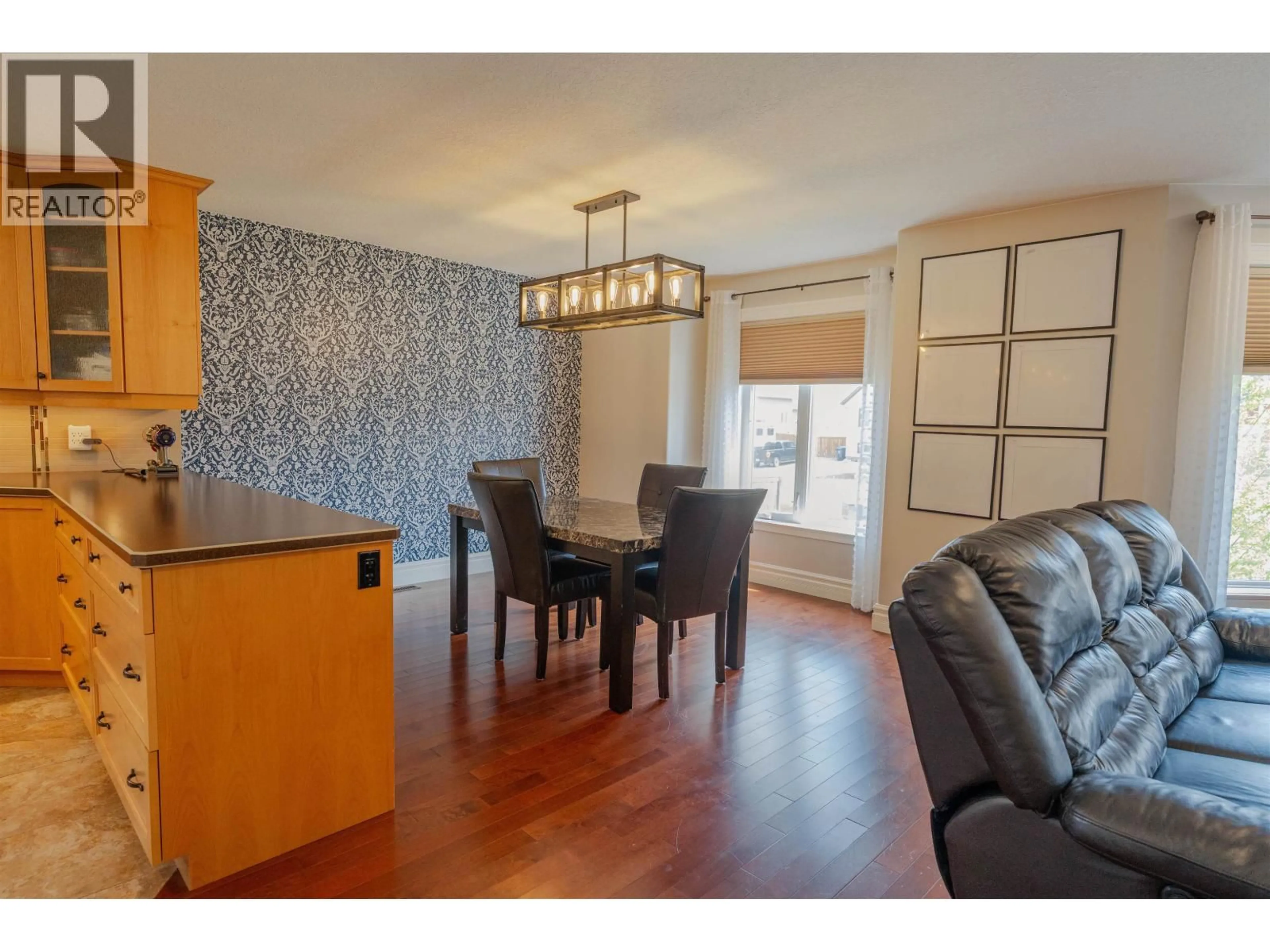 Dining room, wood/laminate floor for 11716 88 STREET, Fort St. John British Columbia V1J0H8