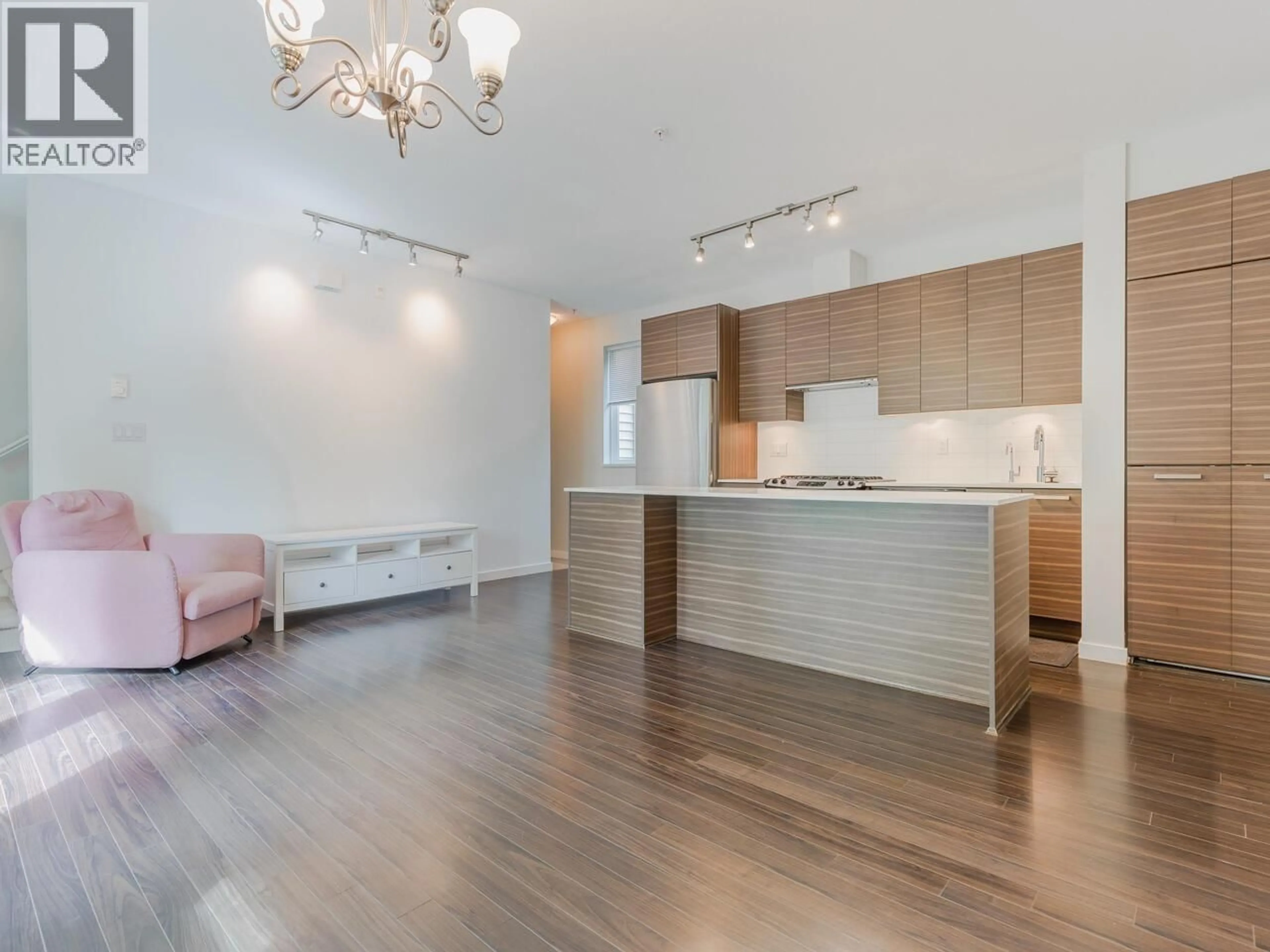 Open concept kitchen, wood/laminate floor for 42 - 6965 HASTINGS STREET, Burnaby British Columbia V5B1S9
