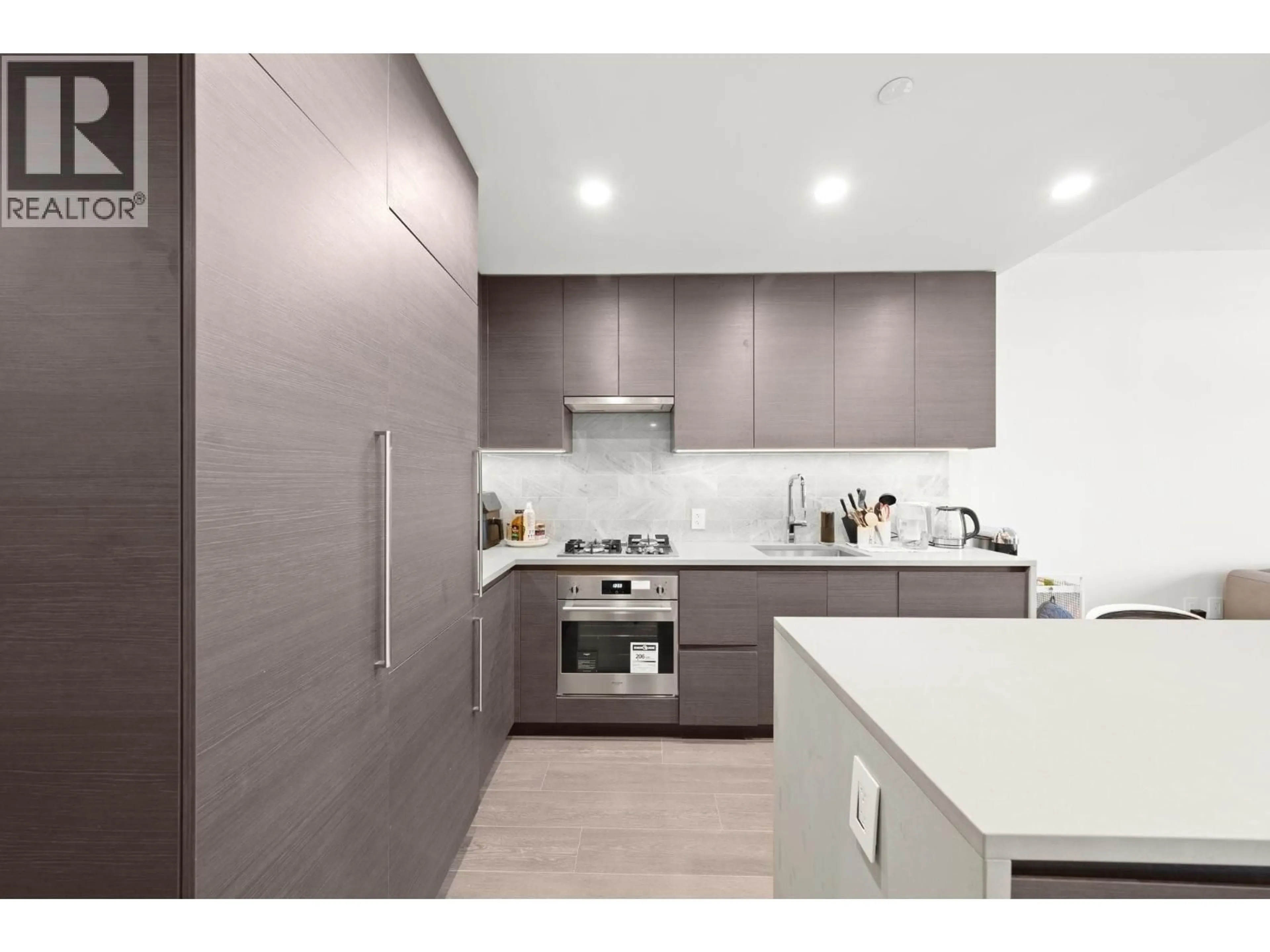 Contemporary kitchen, ceramic/tile floor for 2403 - 4168 LOUGHEED HIGHWAY, Burnaby British Columbia V5C0N9