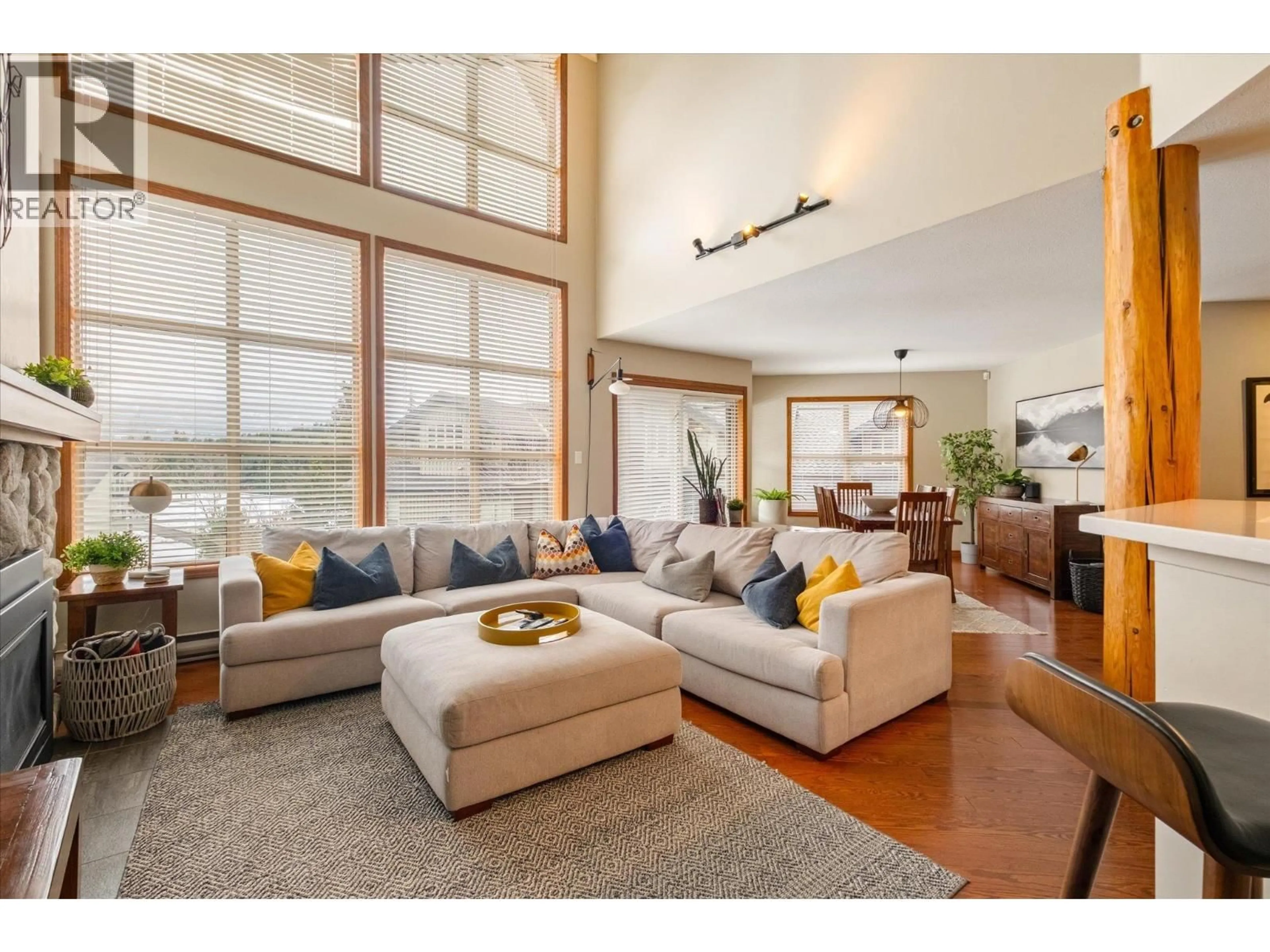 Living room with furniture, wood/laminate floor for 13 - 4644 BLACKCOMB WAY, Whistler British Columbia V8E0H2