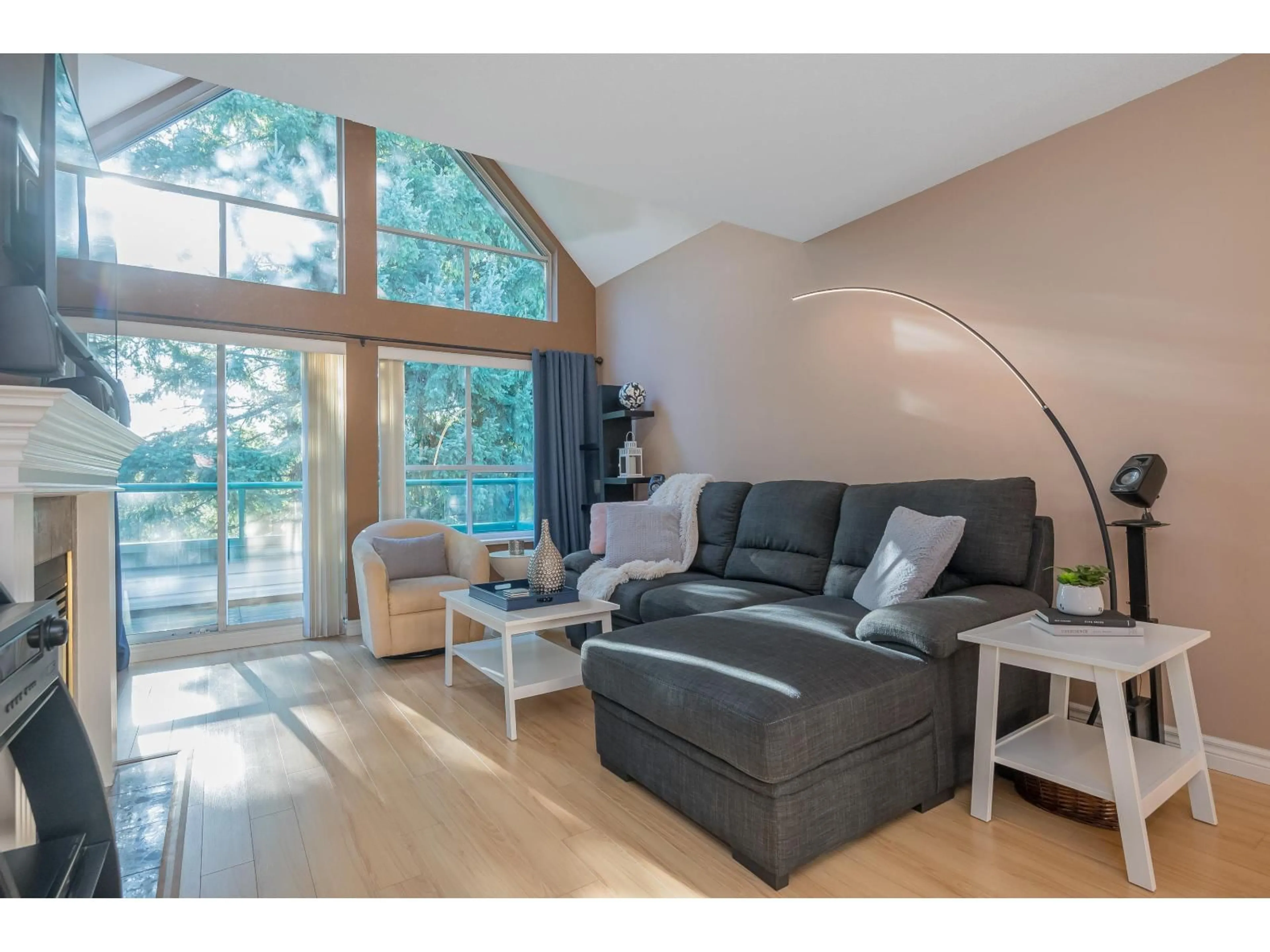 Living room with furniture, wood/laminate floor for 407 - 33280 BOURQUIN CRESCENT EAST, Abbotsford British Columbia V2S7K2