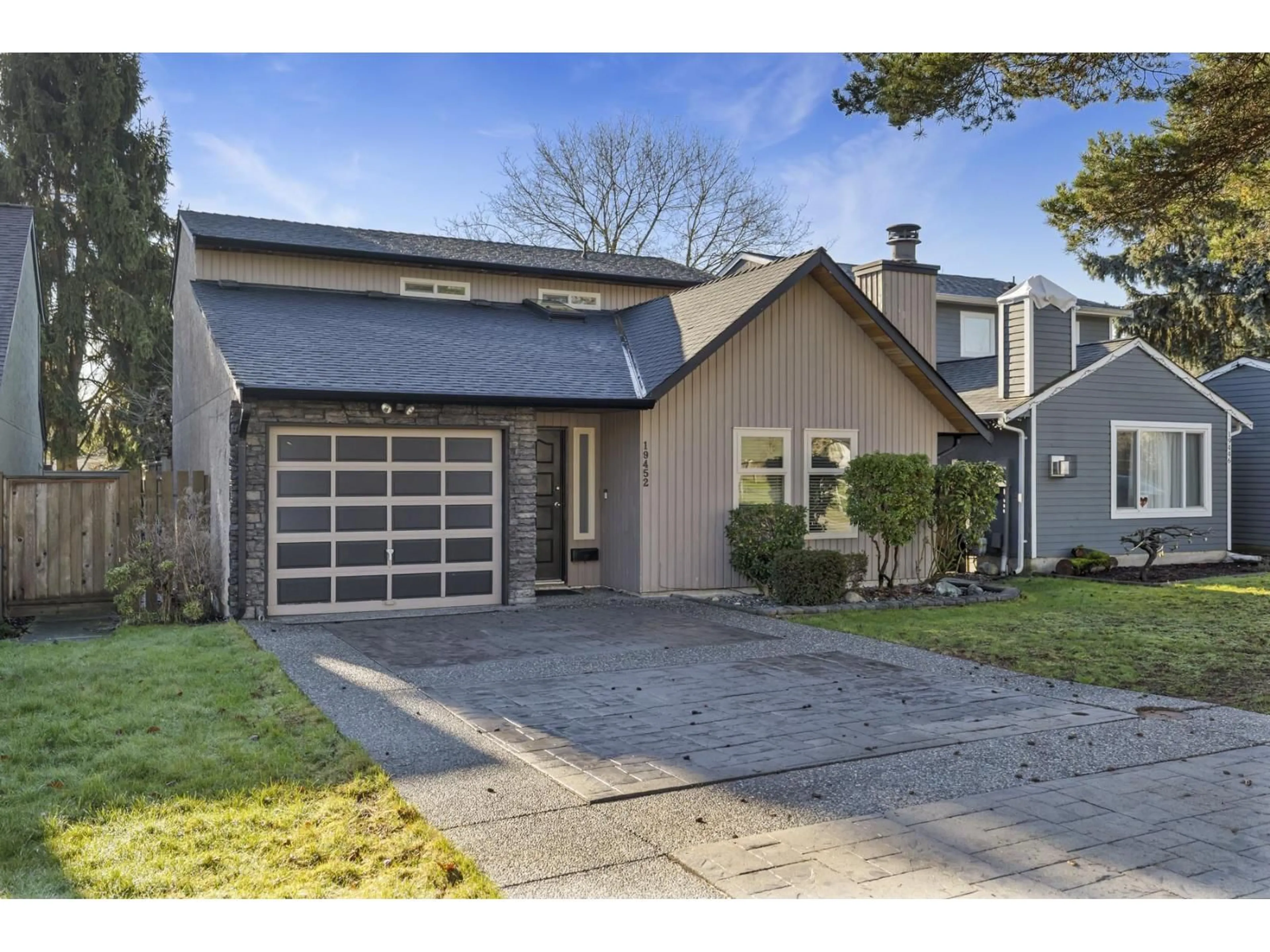 Home with vinyl exterior material, street for 19452 61 AVENUE, Surrey British Columbia V3S7L3