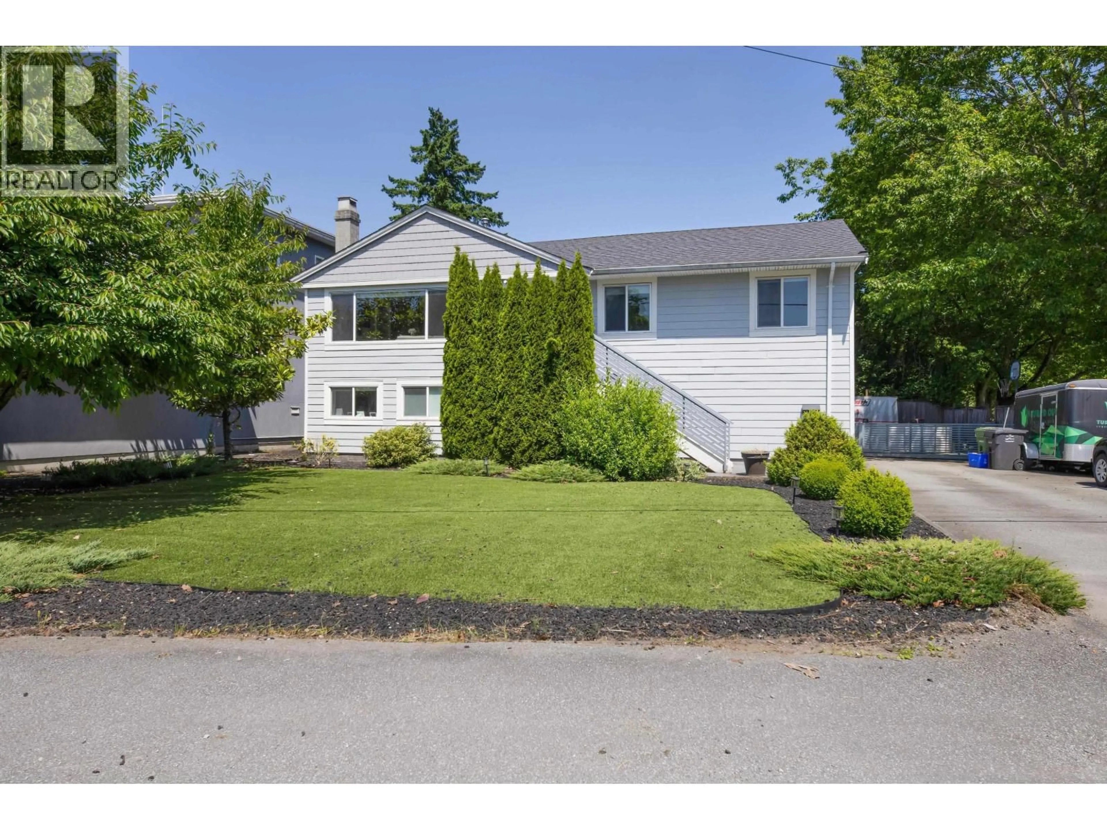 Home with vinyl exterior material, street for 23177 WILLETT AVENUE, Richmond British Columbia V6V3C6