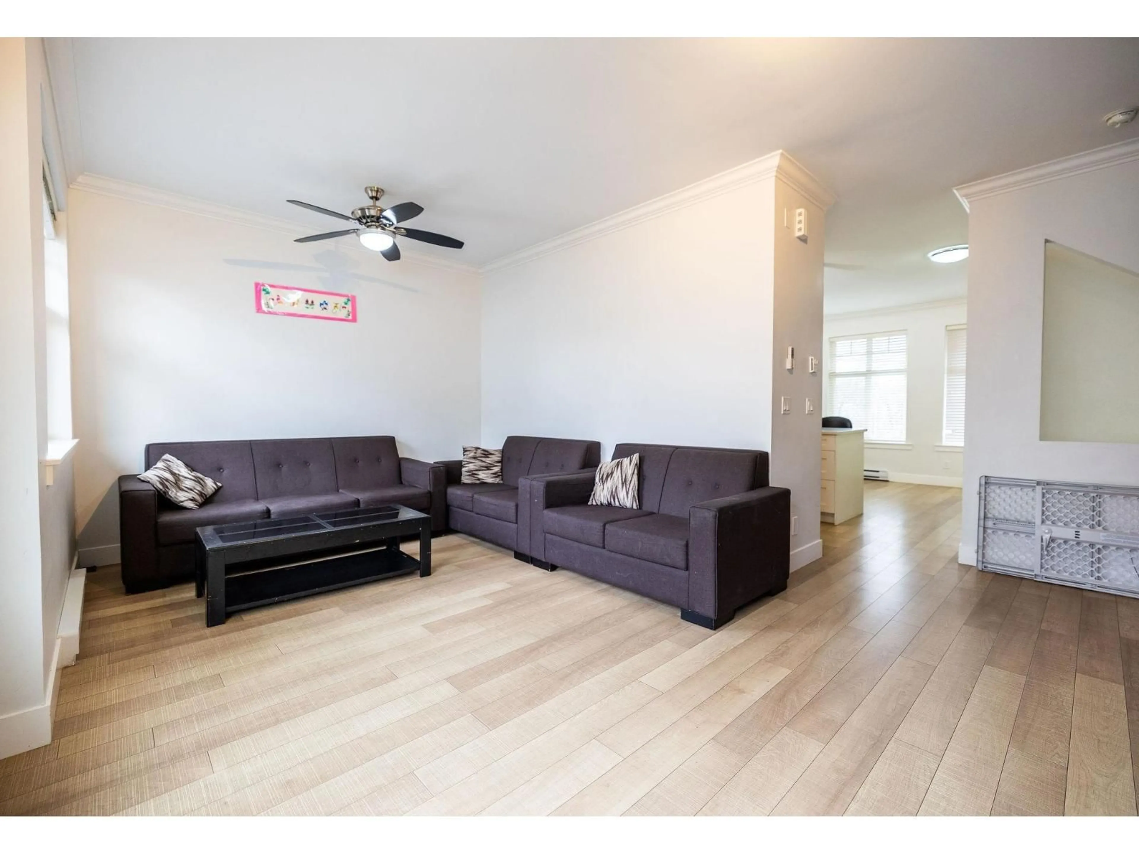 Living room with furniture, wood/laminate floor for 7 - 6350 142 STREET, Surrey British Columbia V3X1B8