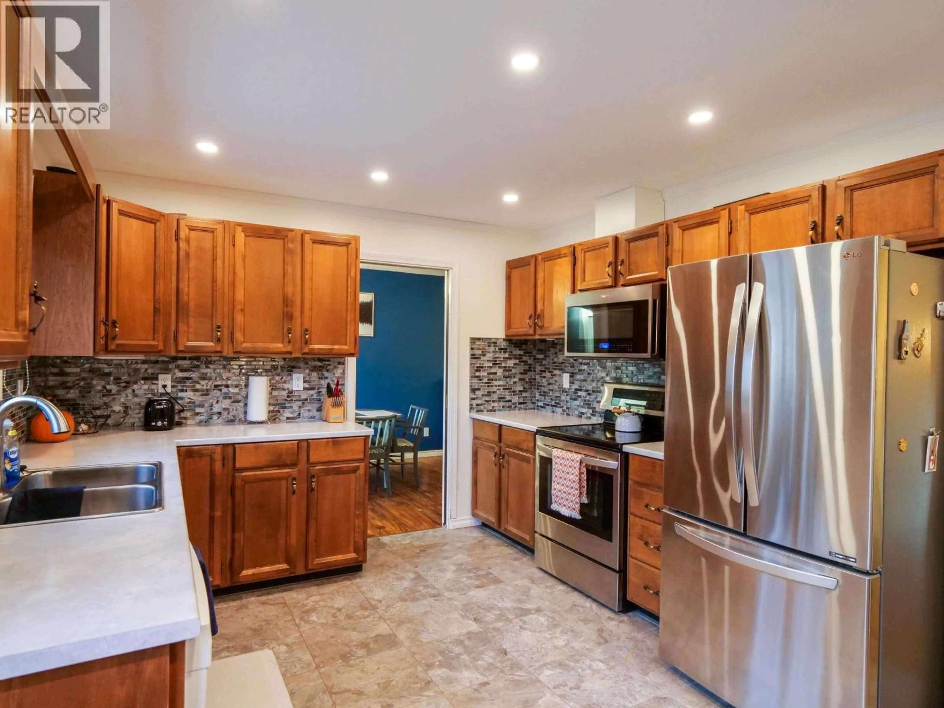 Open concept kitchen, ceramic/tile floor for 3050 BELCARRA ROAD, Quesnel British Columbia V2J5A9