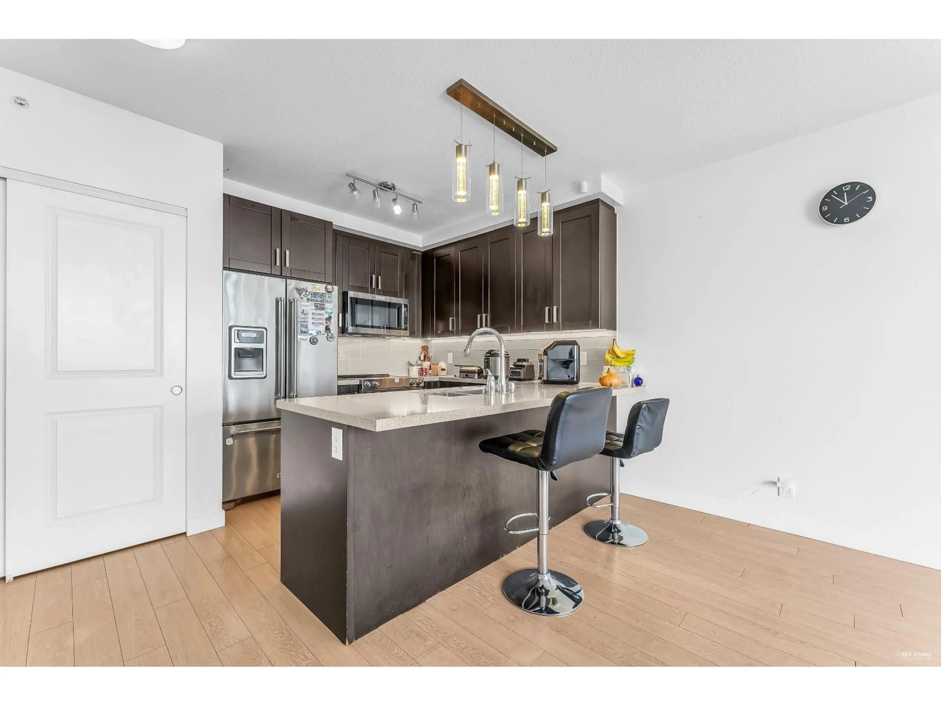 Open concept kitchen, wood/laminate floor for 3207 - 11967 80 AVENUE, Delta British Columbia V4C0E2