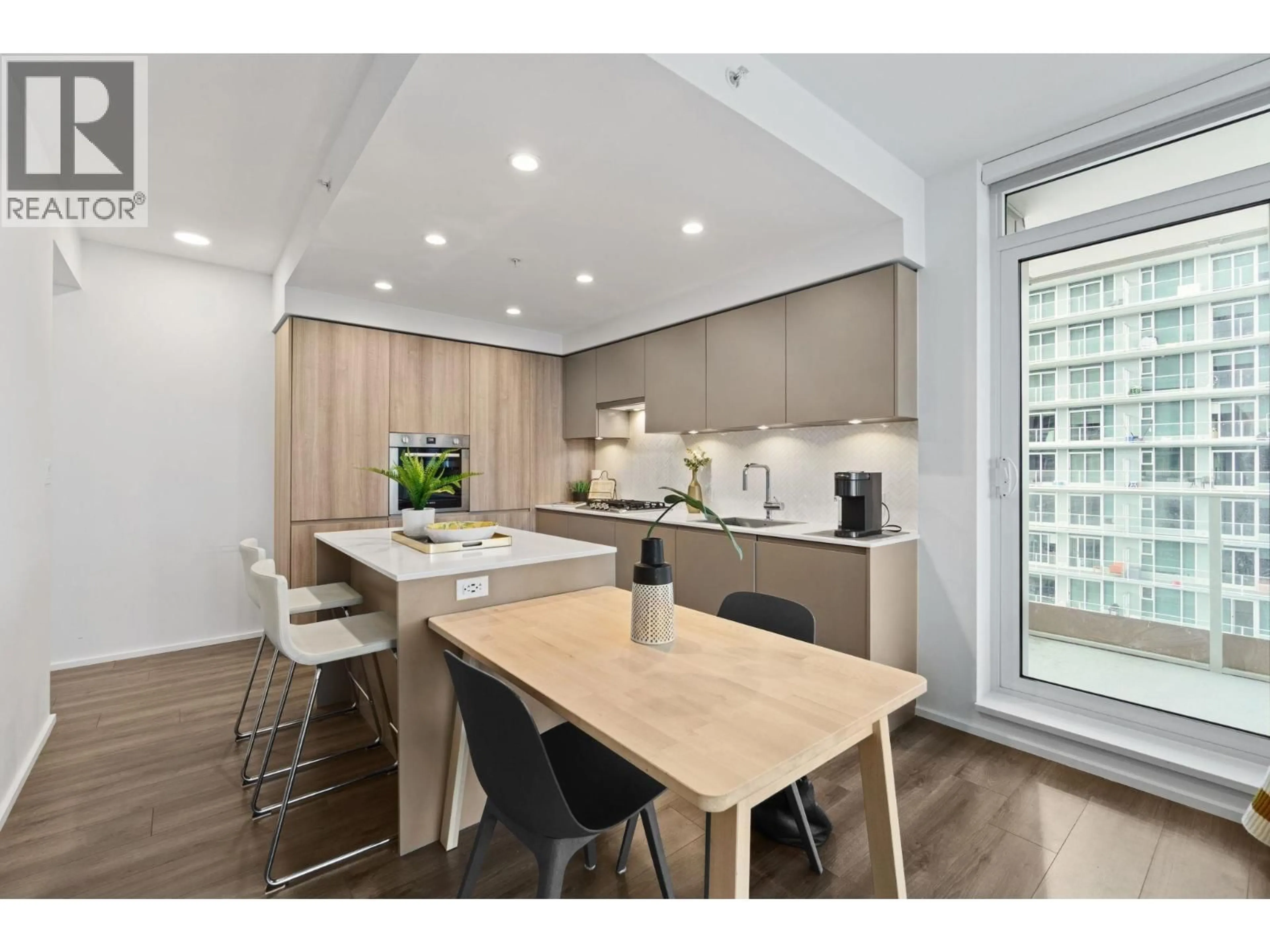 Open concept kitchen, wood/laminate floor for 2801 - 3833 EVERGREEN PLACE, Burnaby British Columbia V3J0M2