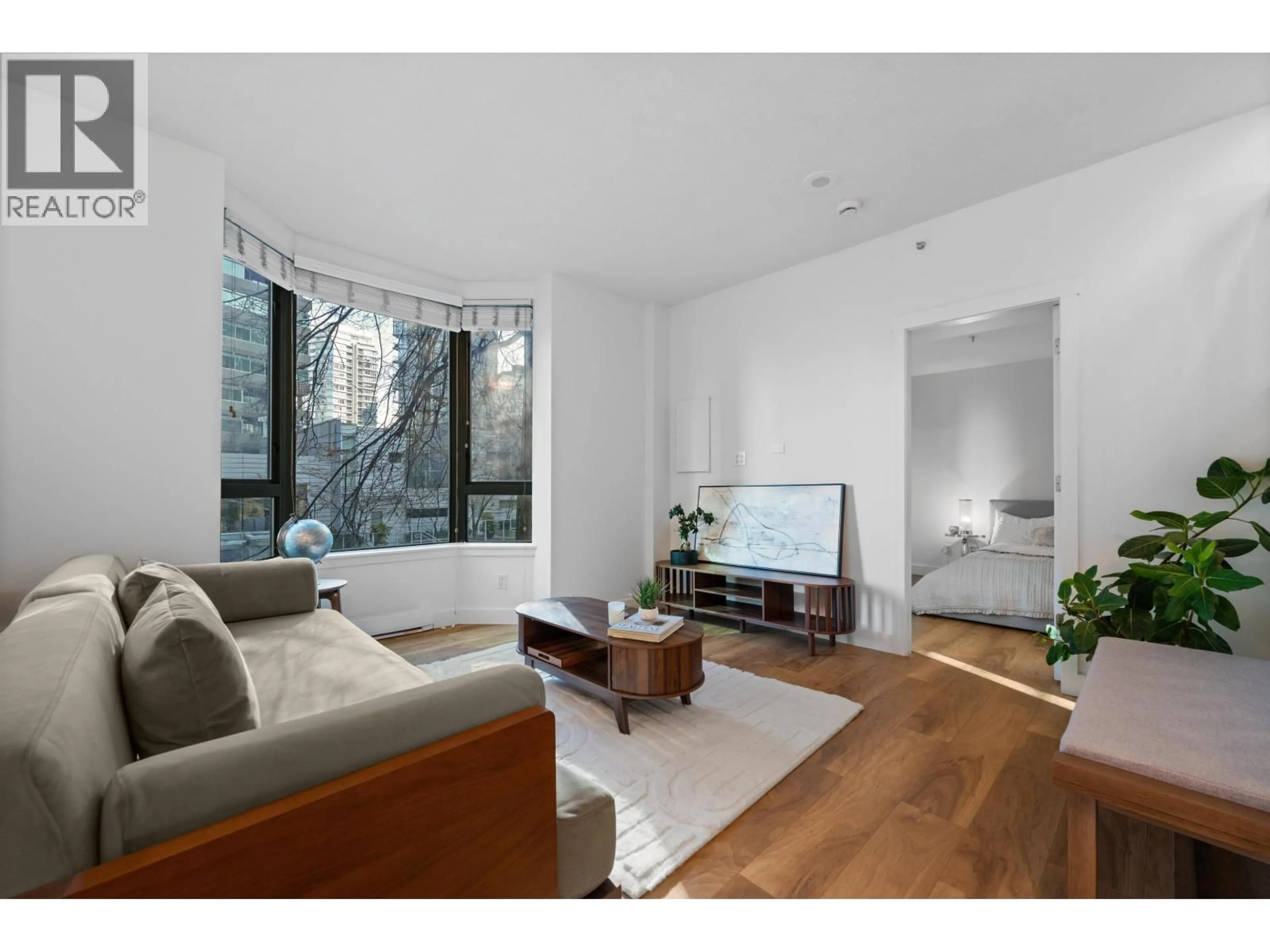 Living room with furniture, unknown for 203 - 1238 MELVILLE STREET, Vancouver British Columbia V6E4N2