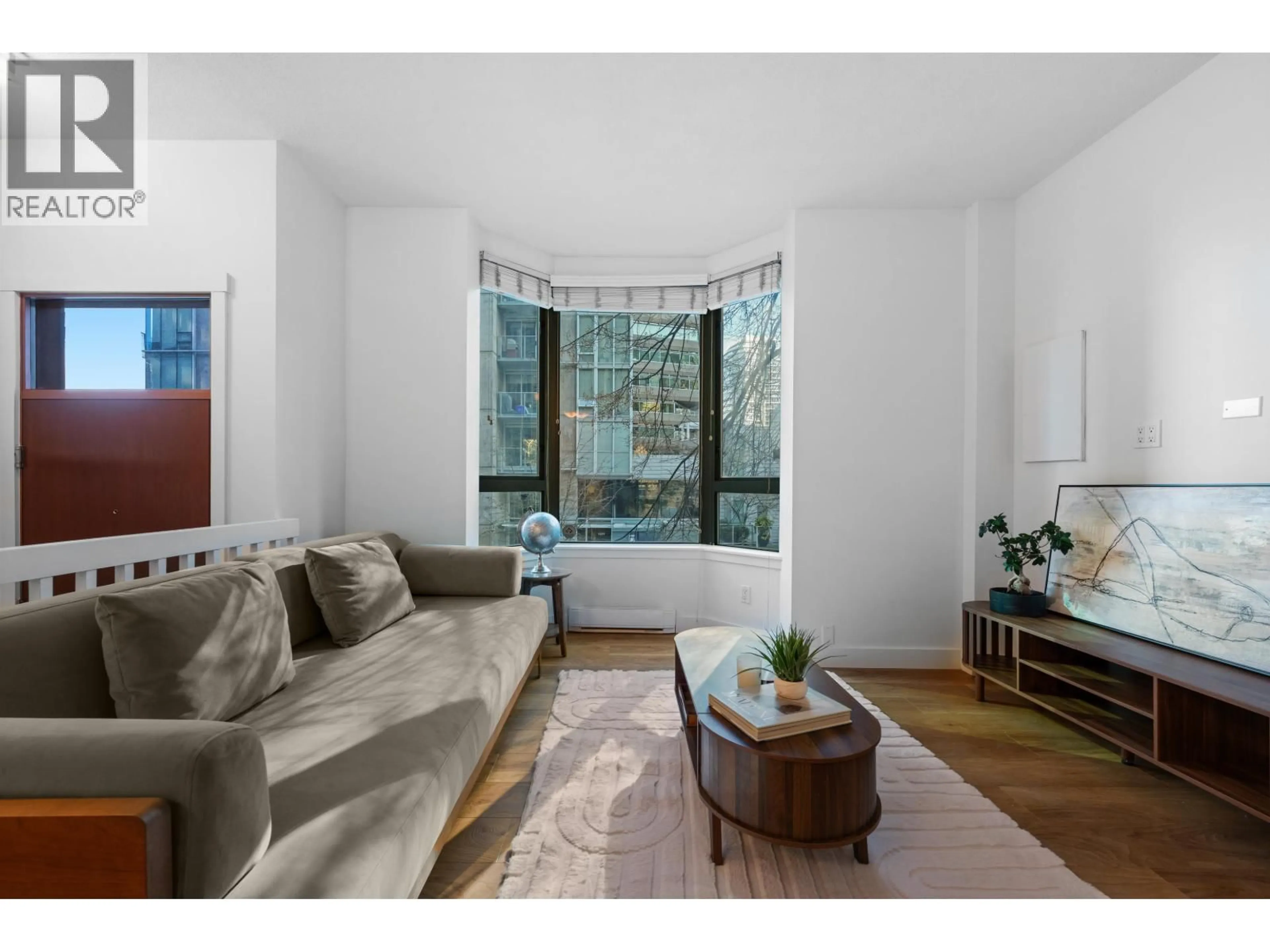 Living room with furniture, unknown for 203 - 1238 MELVILLE STREET, Vancouver British Columbia V6E4N2