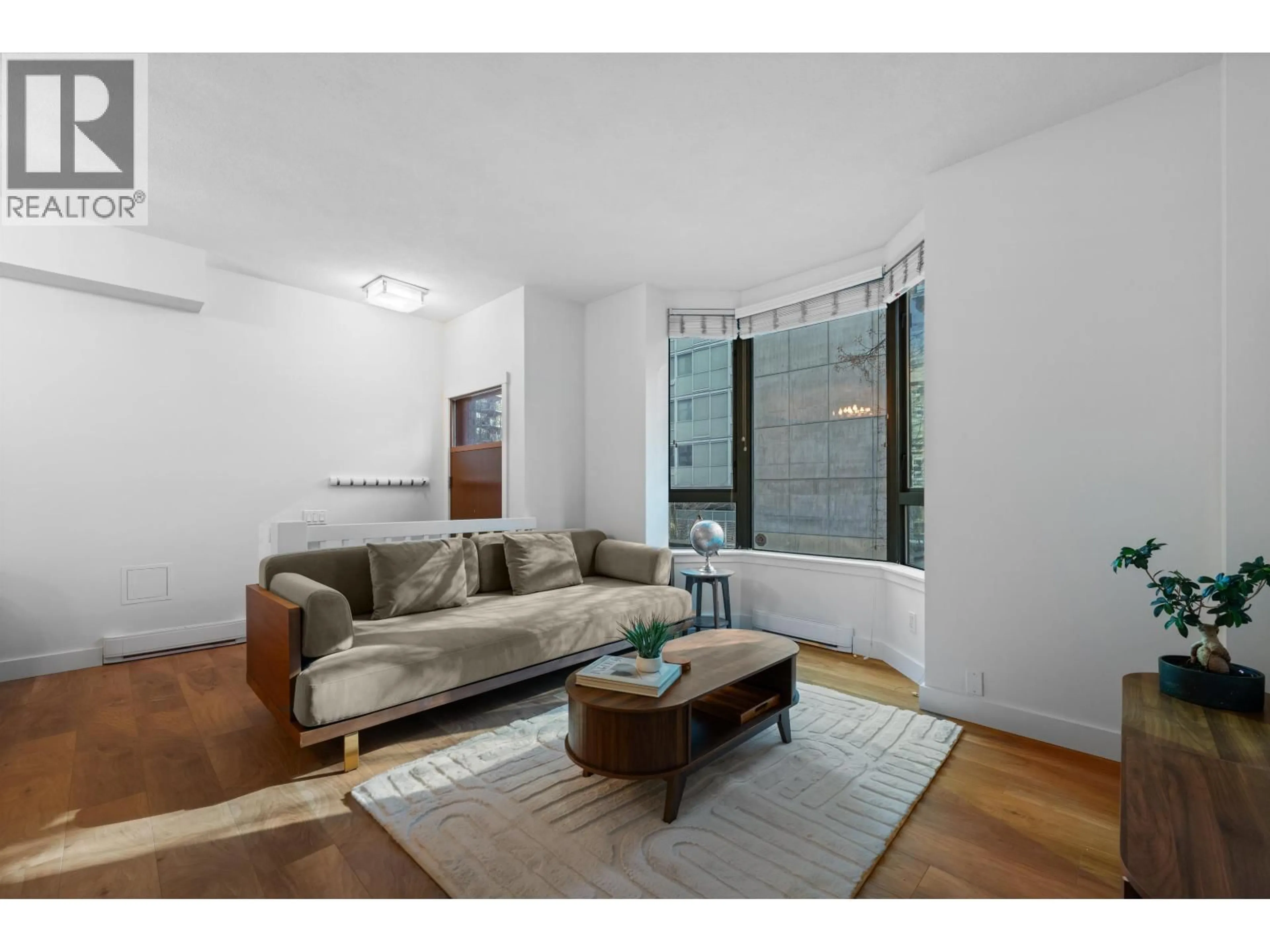 Living room with furniture, unknown for 203 - 1238 MELVILLE STREET, Vancouver British Columbia V6E4N2