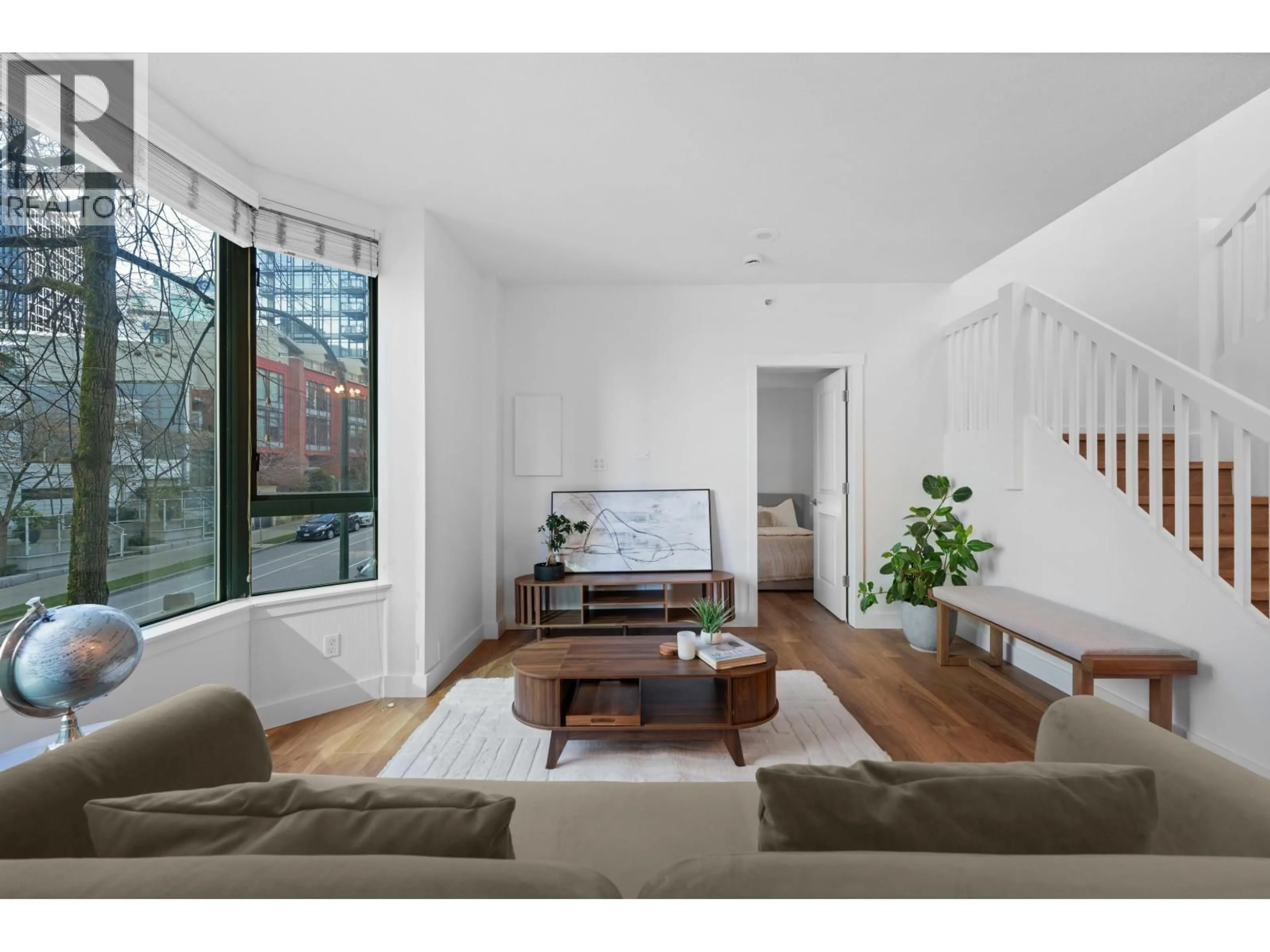 Living room with furniture, unknown for 203 - 1238 MELVILLE STREET, Vancouver British Columbia V6E4N2