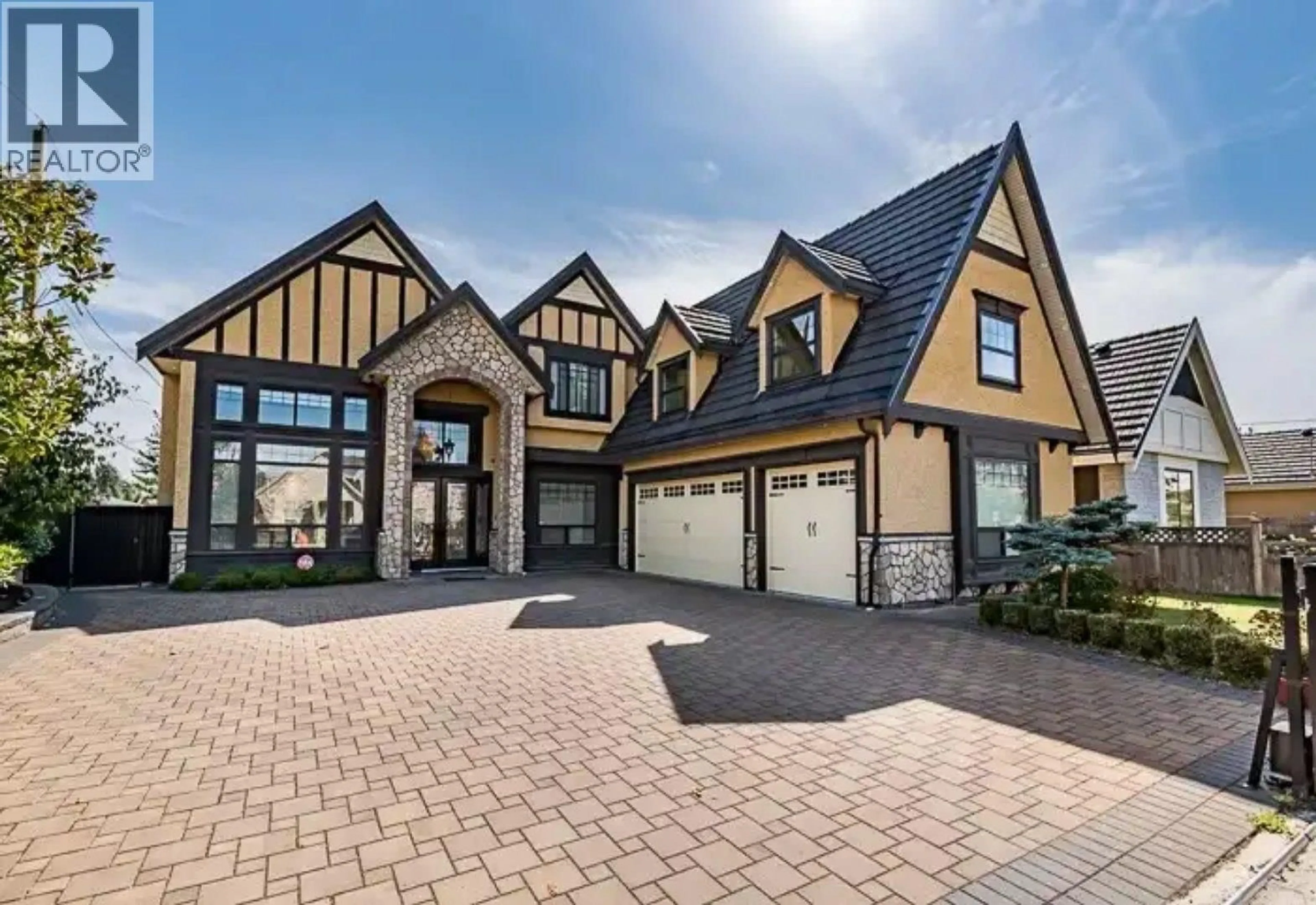 Home with brick exterior material, street for 9760 SAUNDERS ROAD, Richmond British Columbia V7A2B4