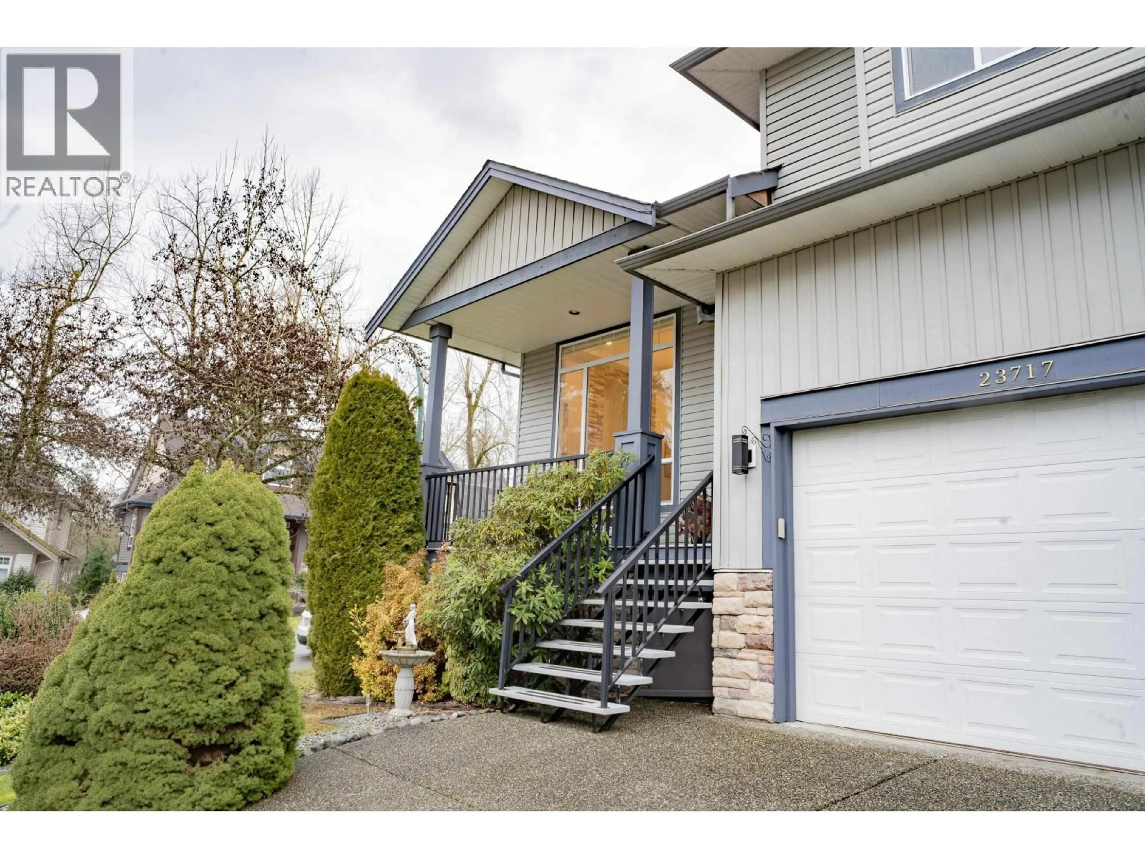 Home with vinyl exterior material, street for 23717 110 AVENUE, Maple Ridge British Columbia V2W1E7