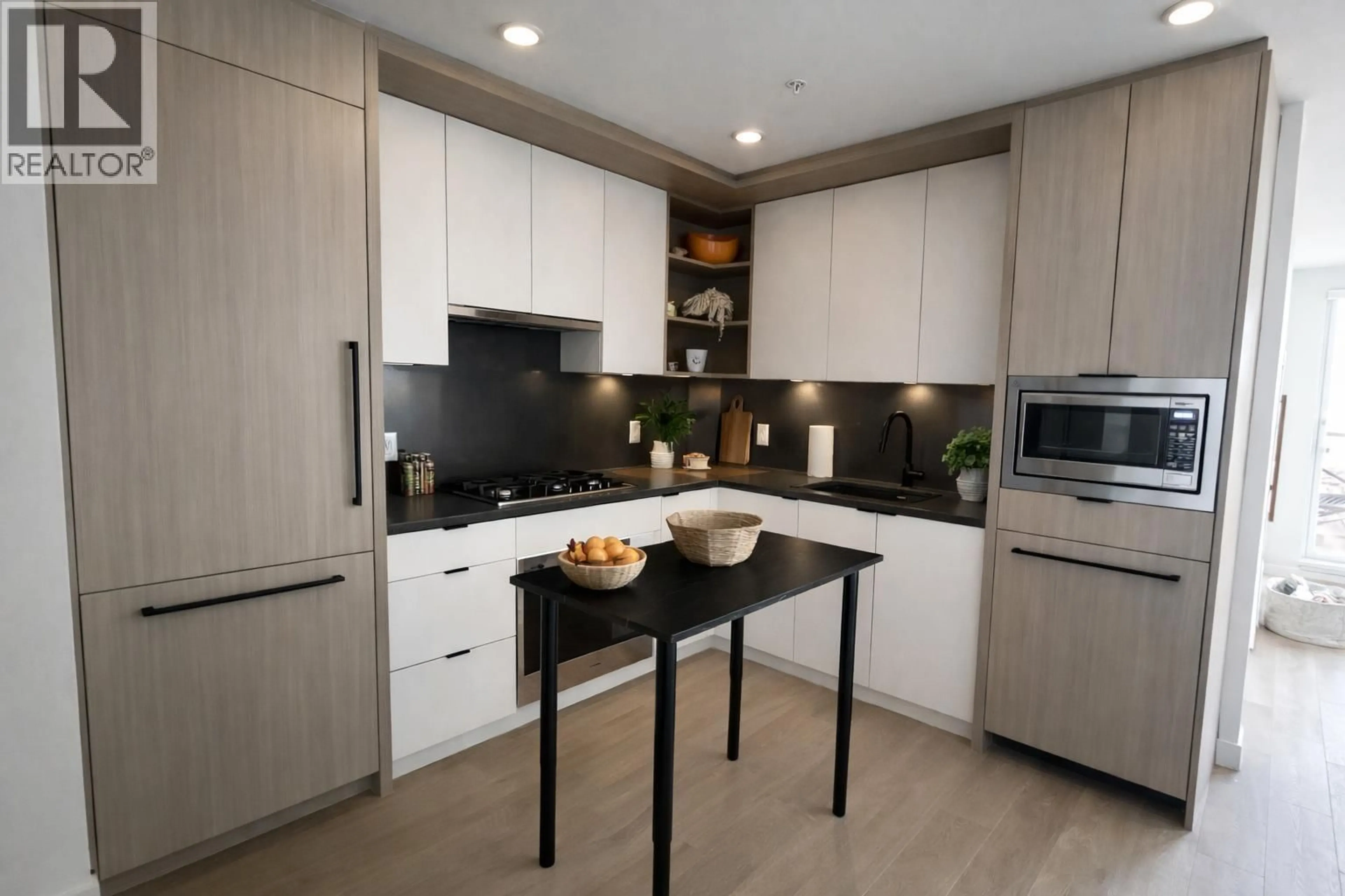 Contemporary kitchen, wood/laminate floor for 407 - 2268 BROADWAY AVENUE, Vancouver British Columbia V5N0L2