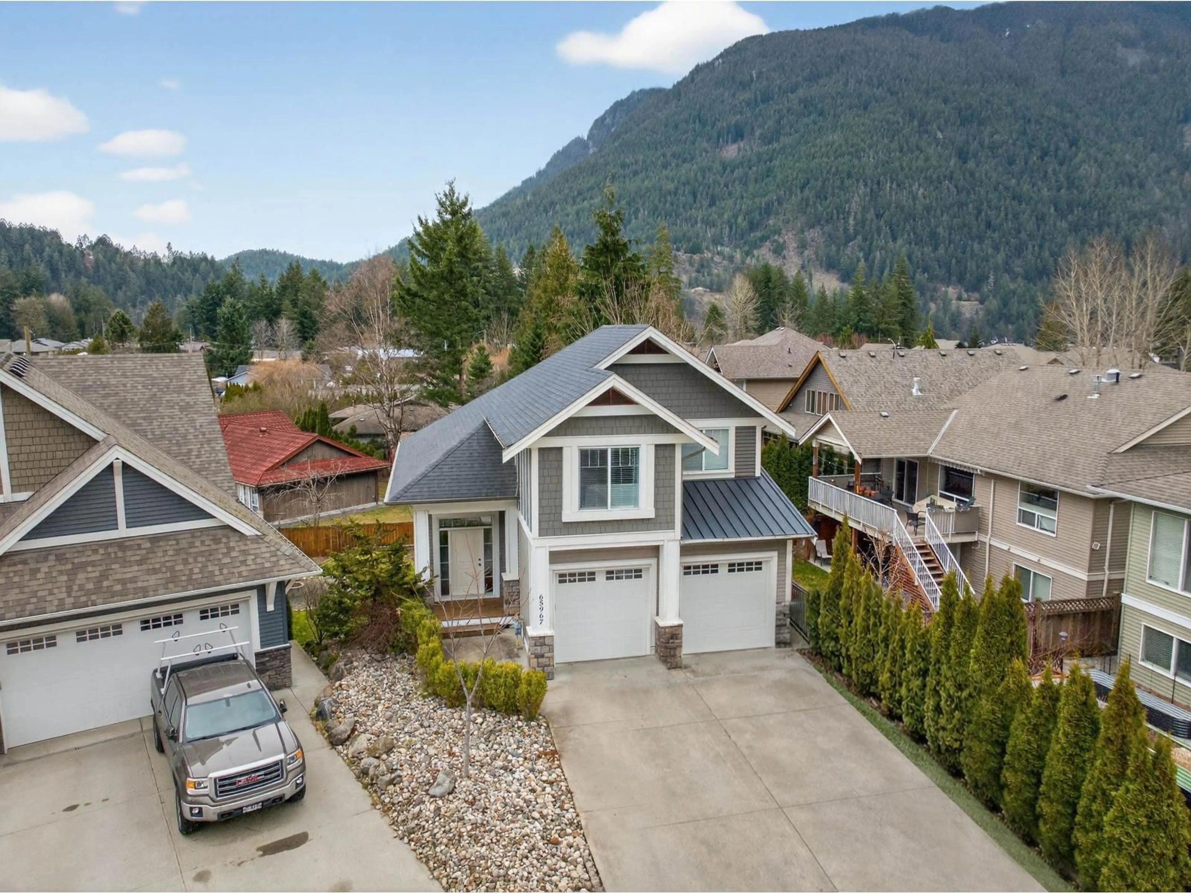 A pic from outside/outdoor area/front of a property/back of a property/a pic from drone, mountain view for 65967 PINE CRESCENT, Hope British Columbia V0X1L1