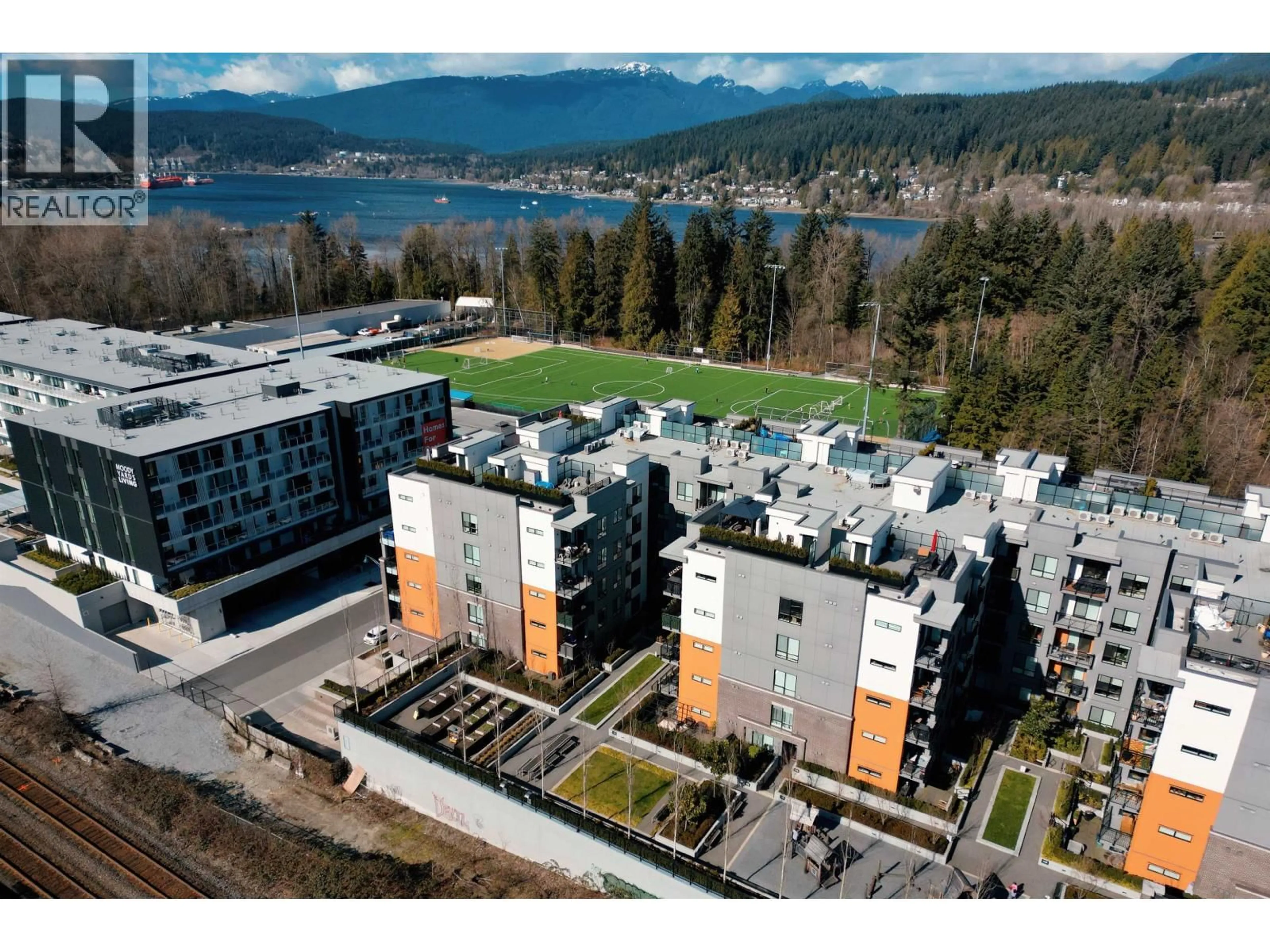 A pic from outside/outdoor area/front of a property/back of a property/a pic from drone, mountain view for 308 - 3131 MURRAY STREET, Port Moody British Columbia V3H0N9
