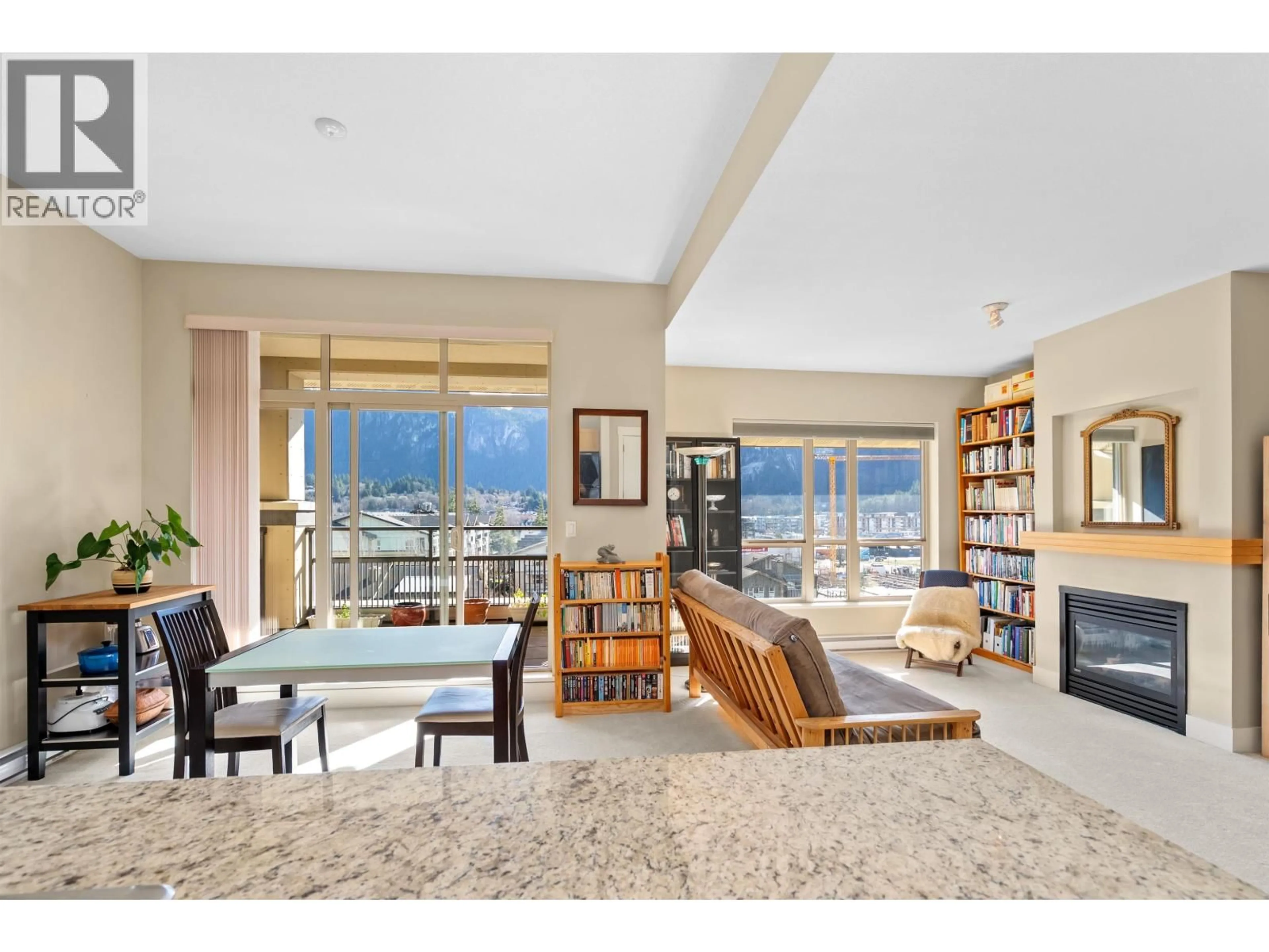 Living room with furniture, unknown for 602 - 1211 VILLAGE GREEN WAY, Squamish British Columbia V8B0R7