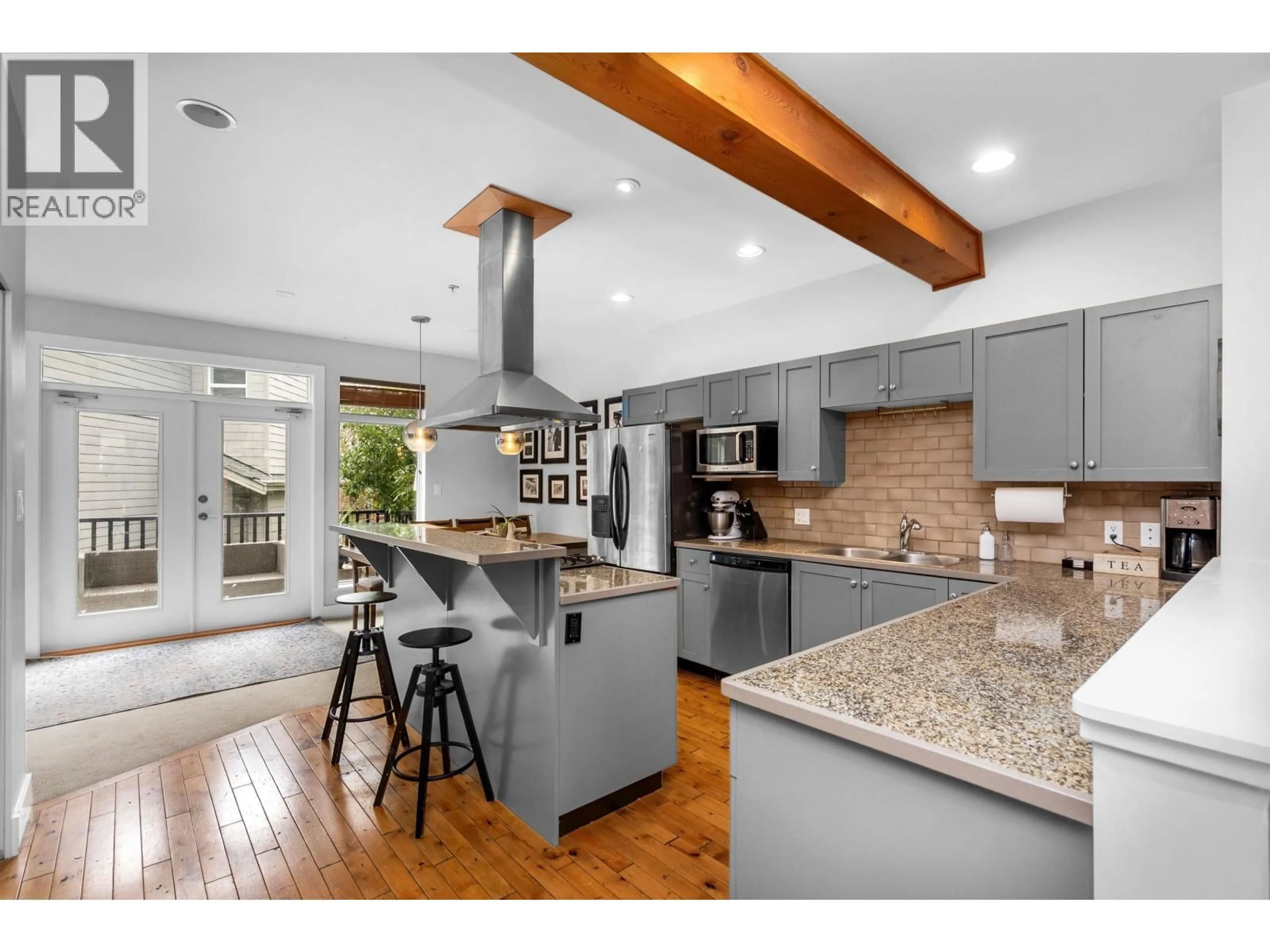 Open concept kitchen, wood/laminate floor for 19 - 39758 GOVERNMENT ROAD, Squamish British Columbia V8B0G3