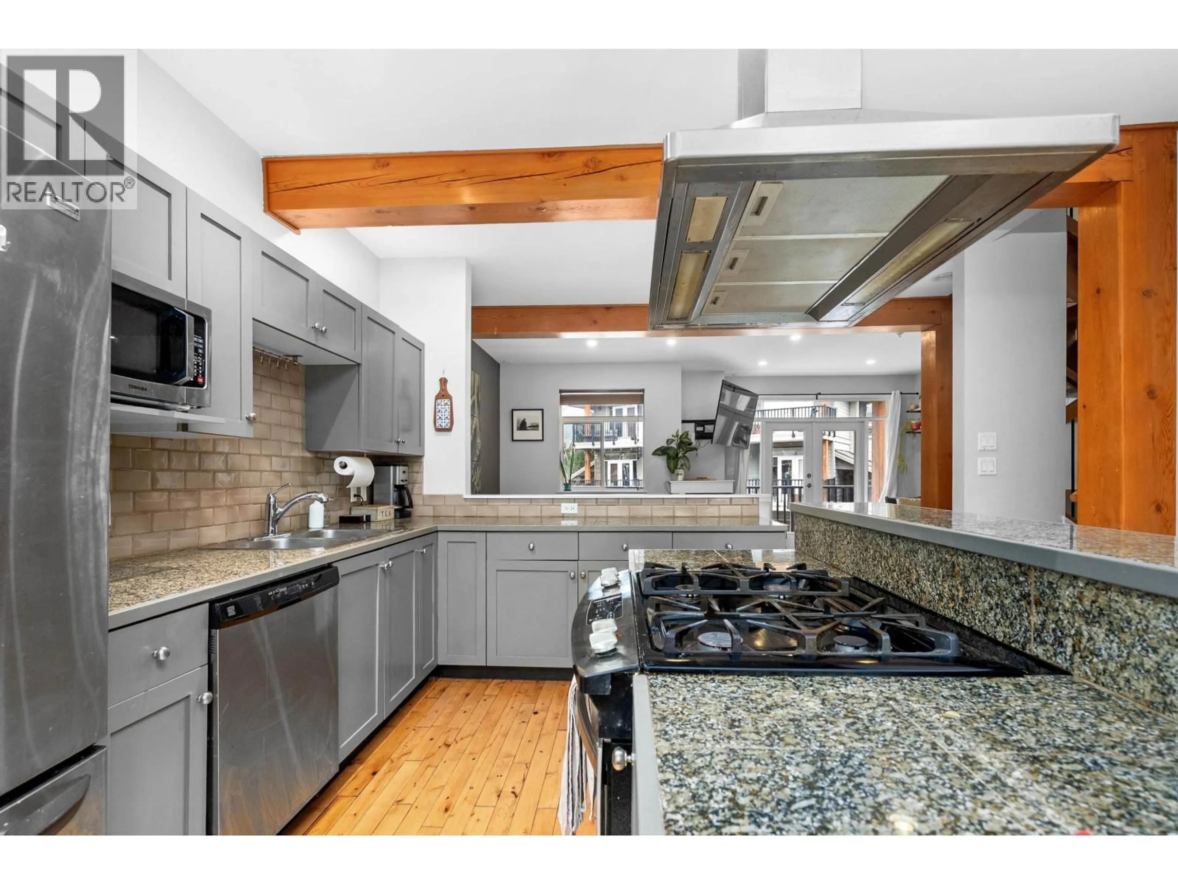 Open concept kitchen, ceramic/tile floor for 19 - 39758 GOVERNMENT ROAD, Squamish British Columbia V8B0G3