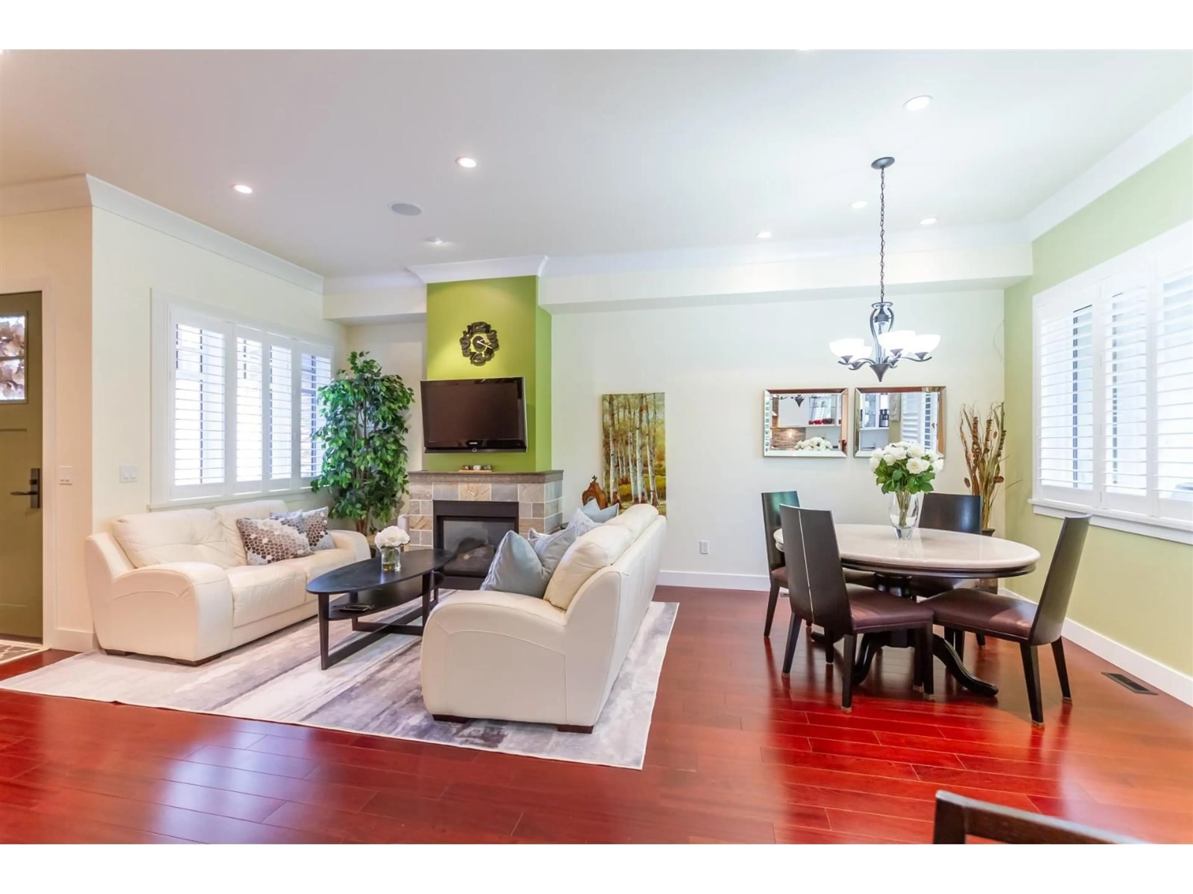 Living room with furniture, wood/laminate floor for 18 - 3122 160 STREET, Surrey British Columbia V3Z8K5